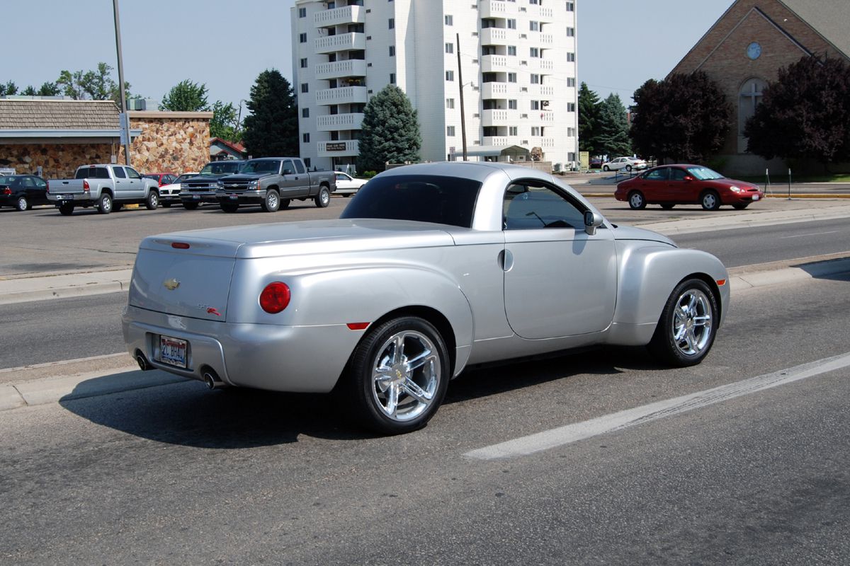 silver chevy ssr on street in idaho