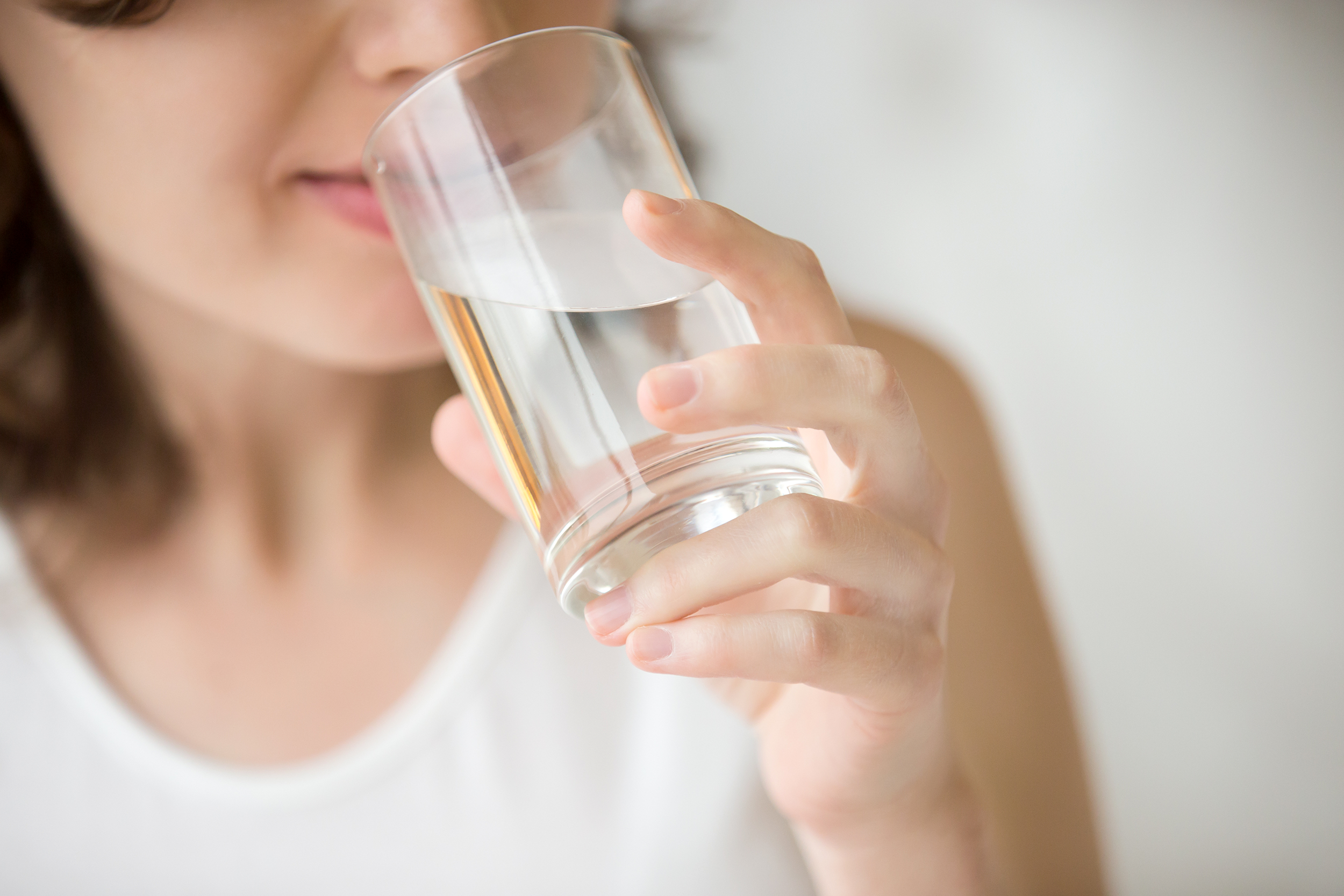 Woman drinking a glass of water