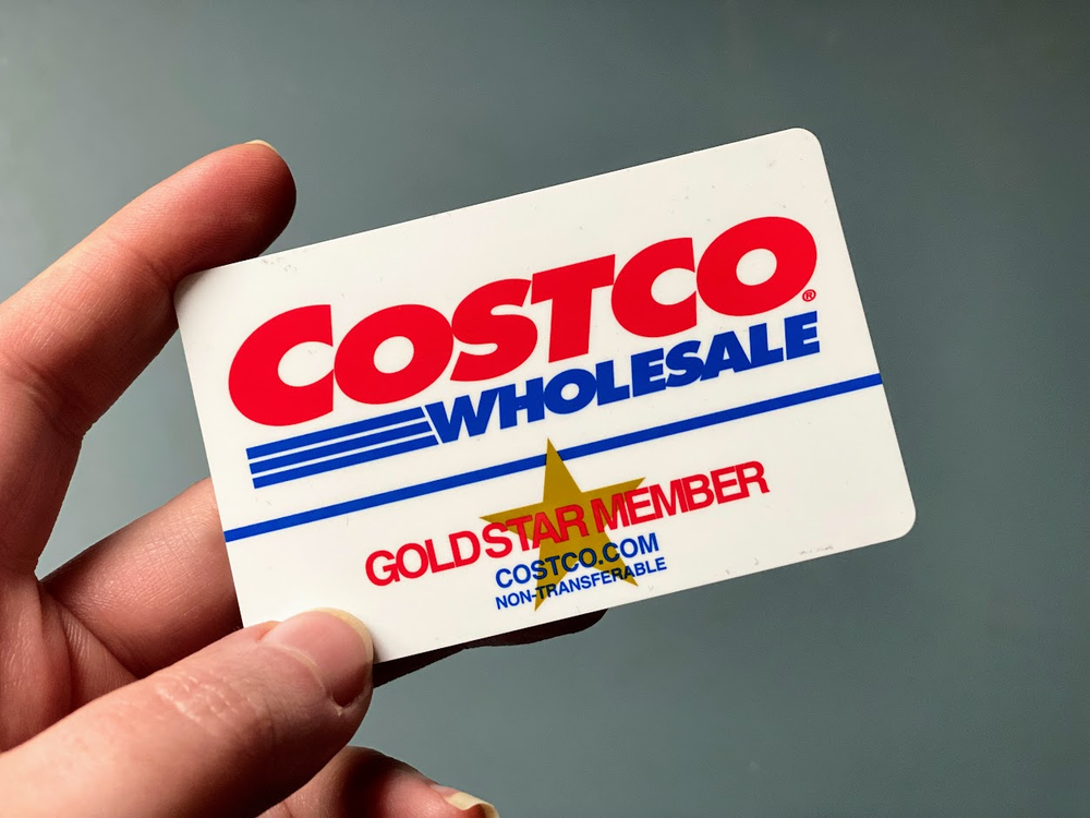 Left Hand Holding a Costco Membership Card, Slightly Tilt