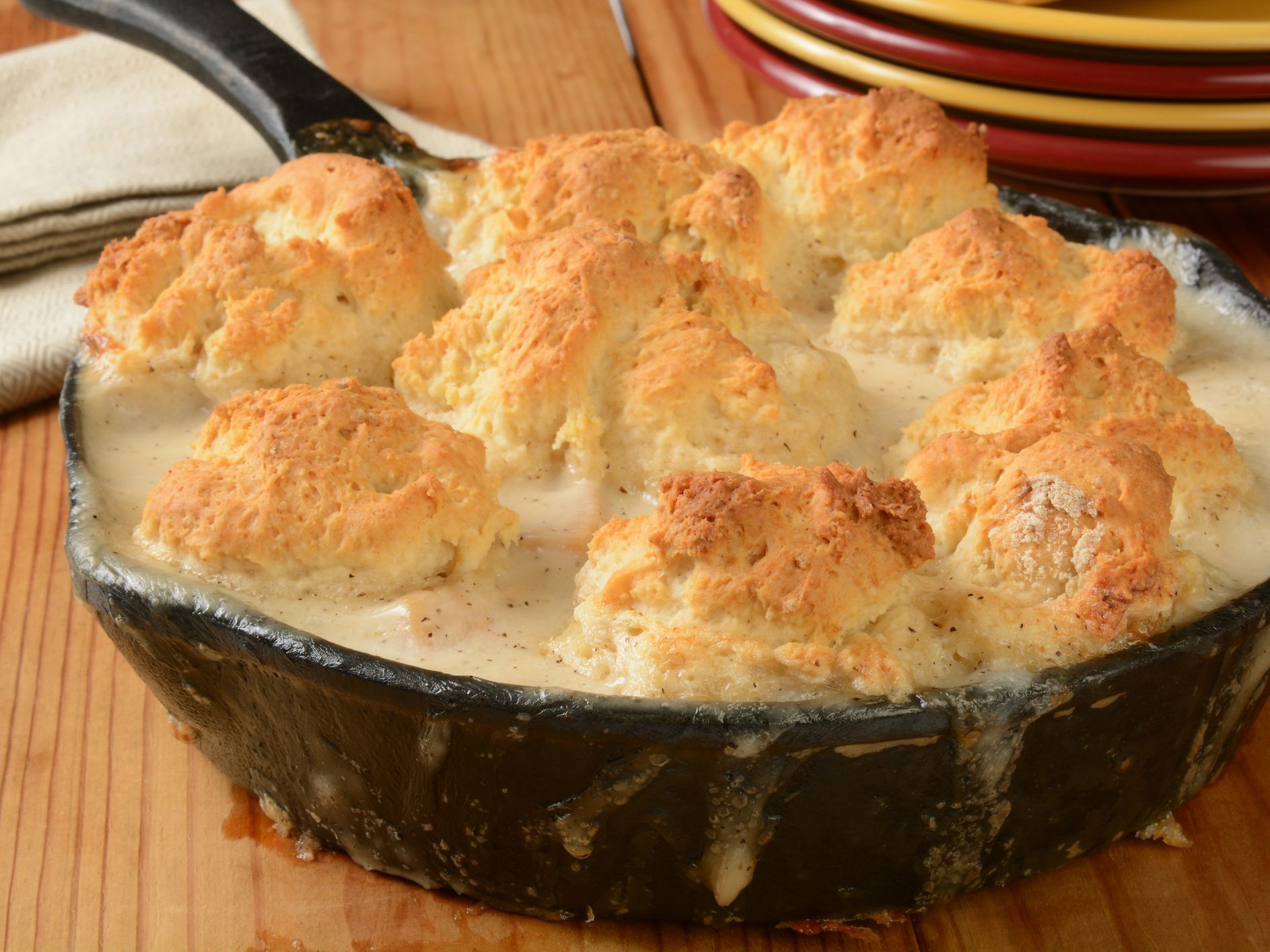 A home baked chicken pot pie or casserole in a cast iron skillet