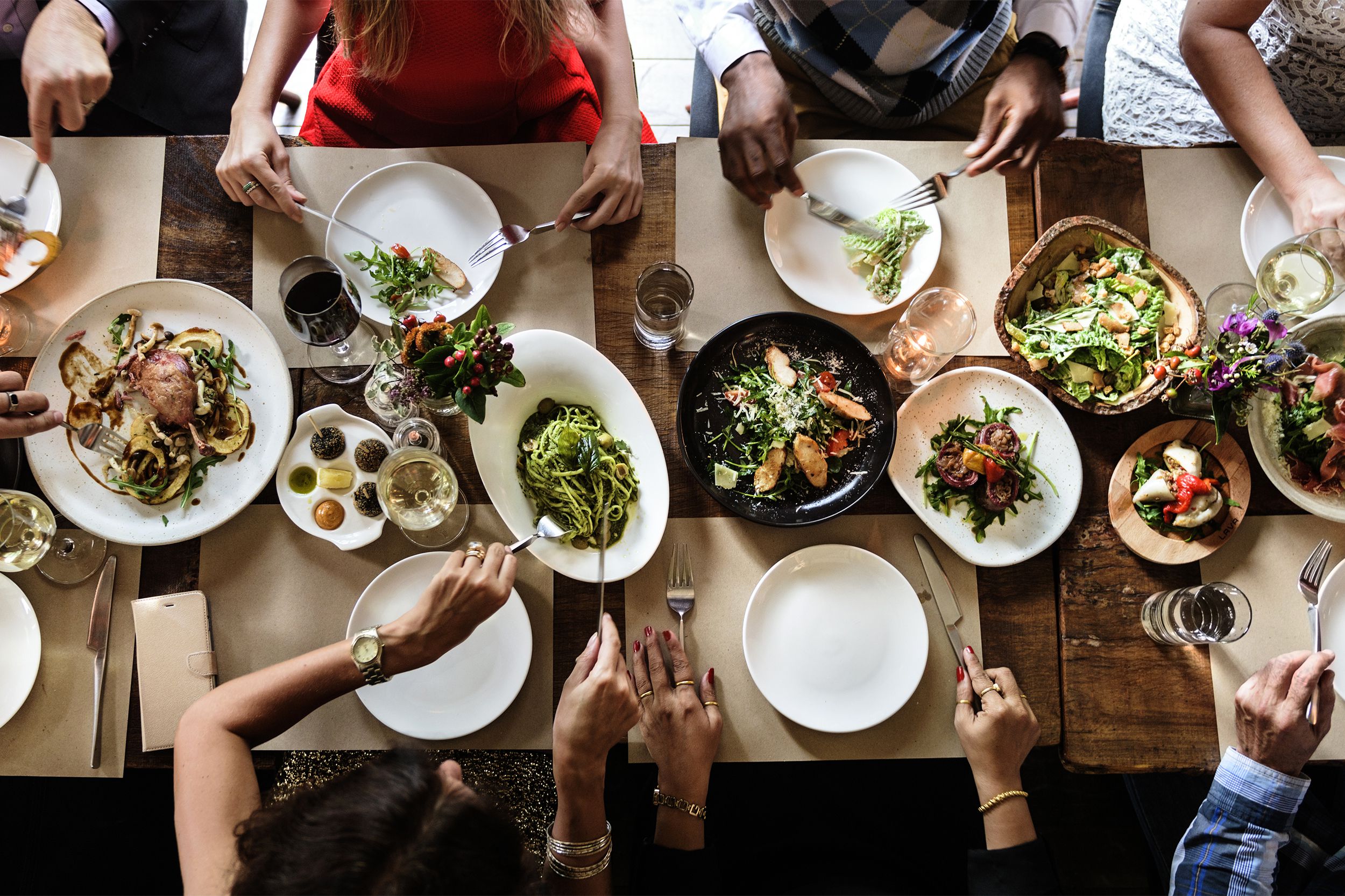 Group sharing dinner at restaurant