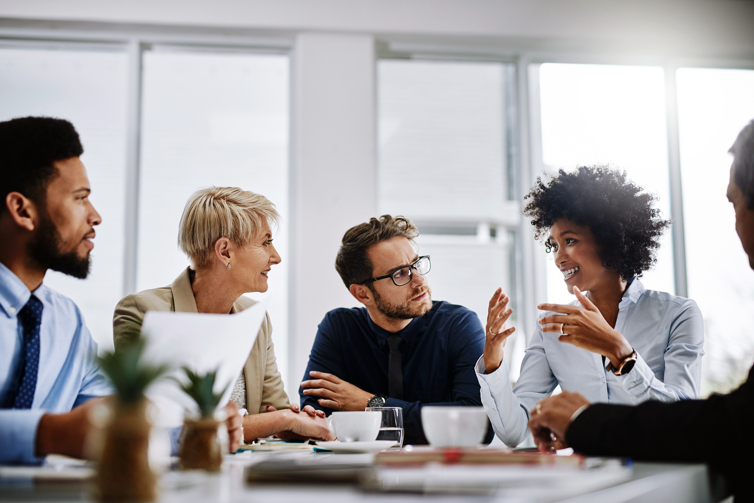 Woman speaking during a company meeting