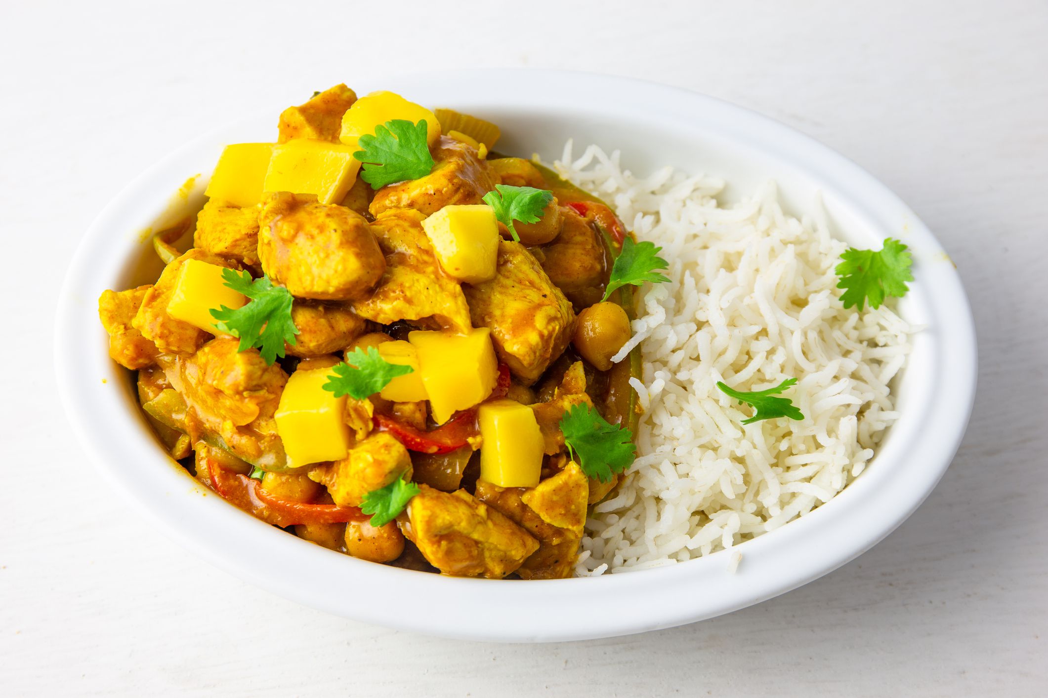 Homemade Mango Coconut Curry Chicken with White Rice and Garlic Naan Flatbread