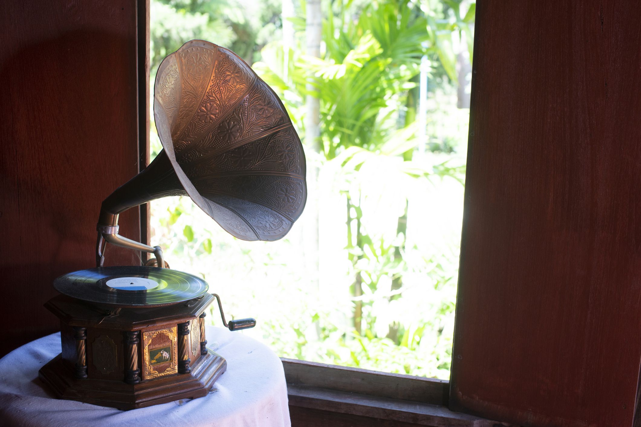 Vintage Gramophone placed at the window