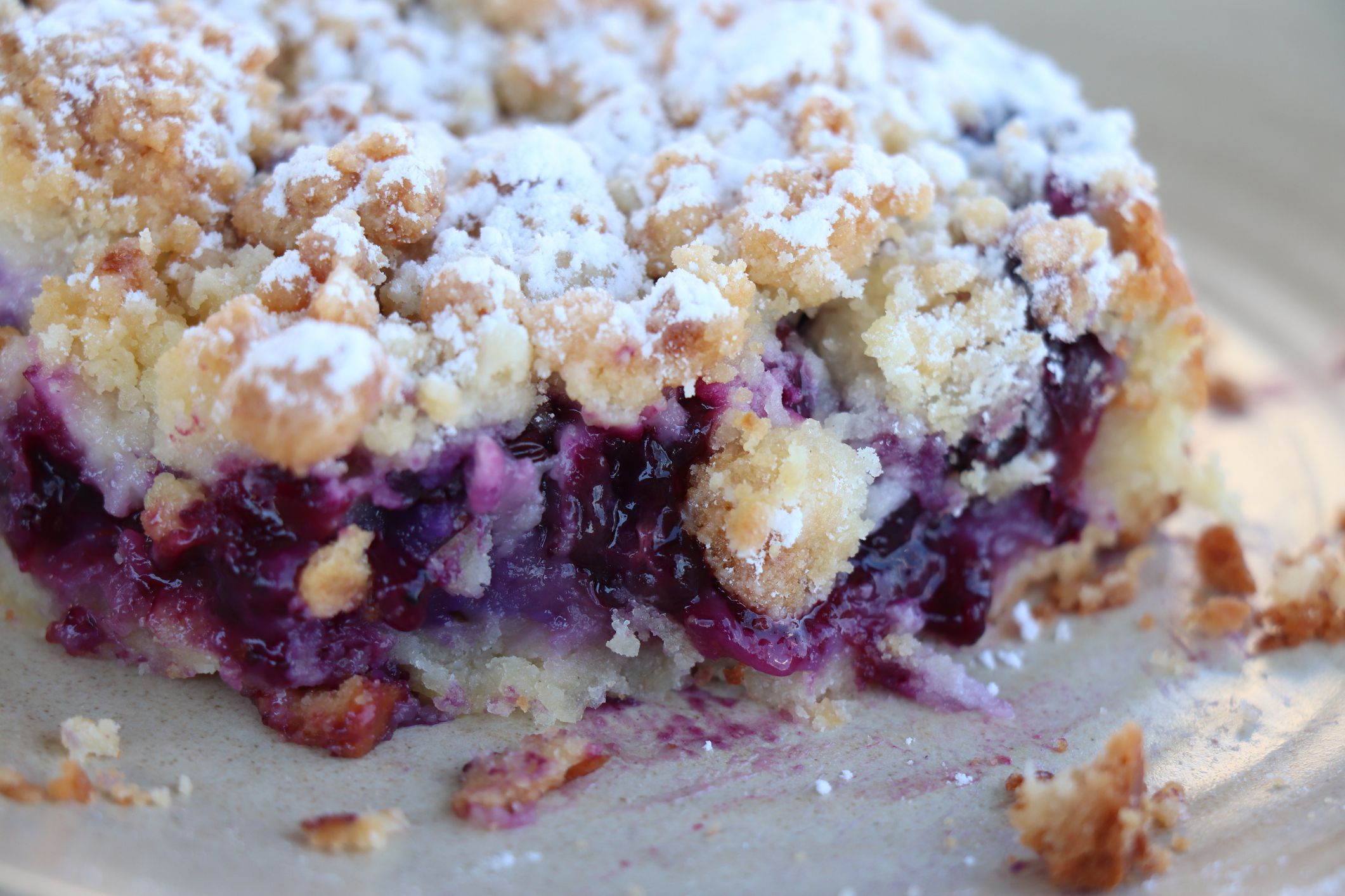 Fresh made raspberry crumble confectionery on a plate