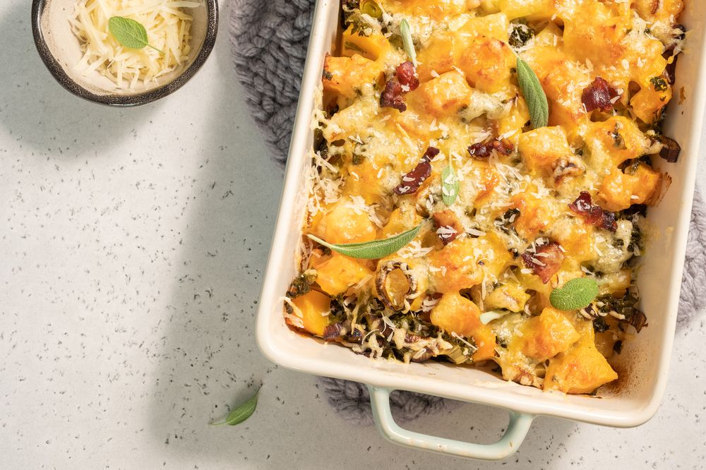 Autumn pumpkin casserole with leek, bacon and kale