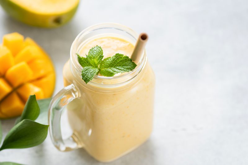 Mango lassi in a glass jar