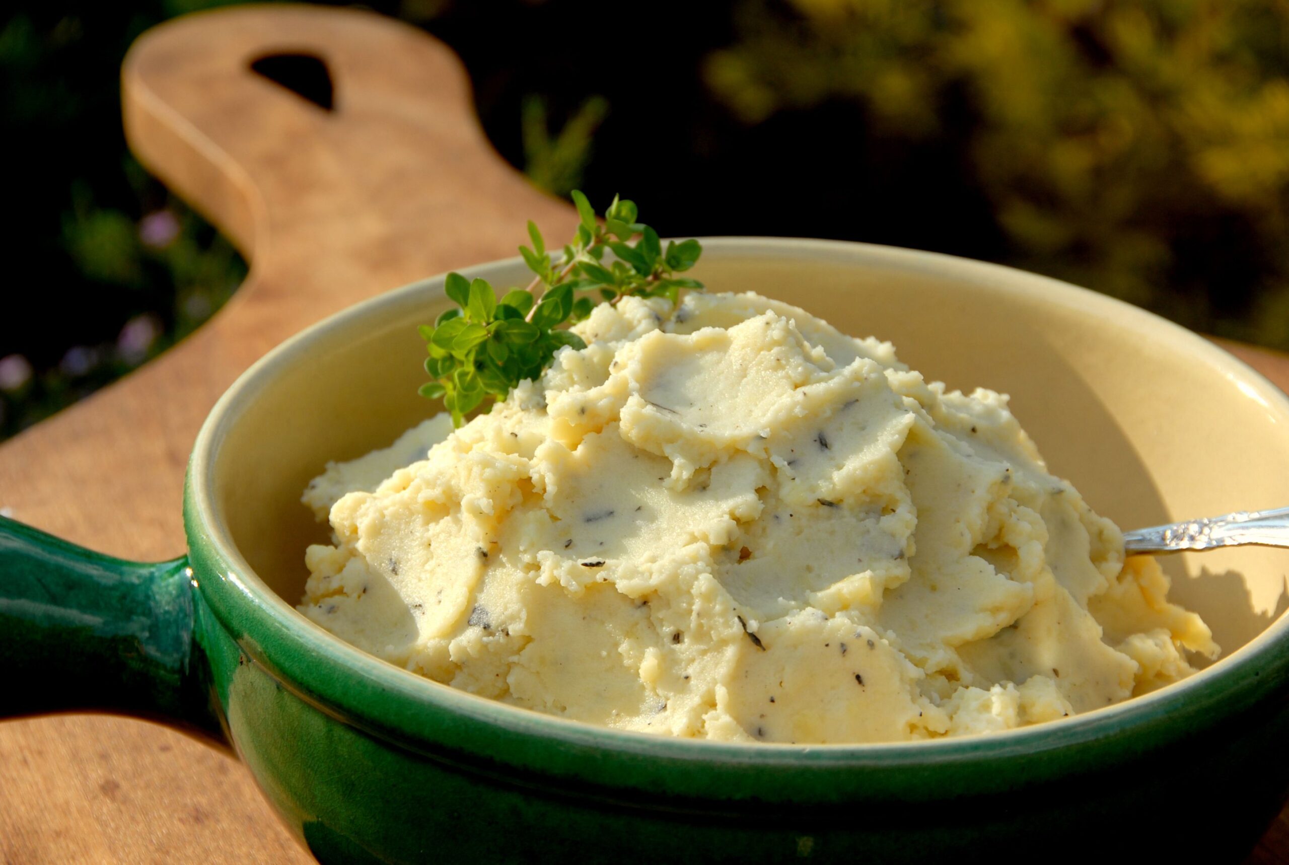 Thanksgiving dinner side dish: mashed potatoes with fresh herbs; rosemary, sage, and thyme. (SEE LIGHTBOXES BELOW for many more holiday food, cooking, vegetables & vegetarian food...)
