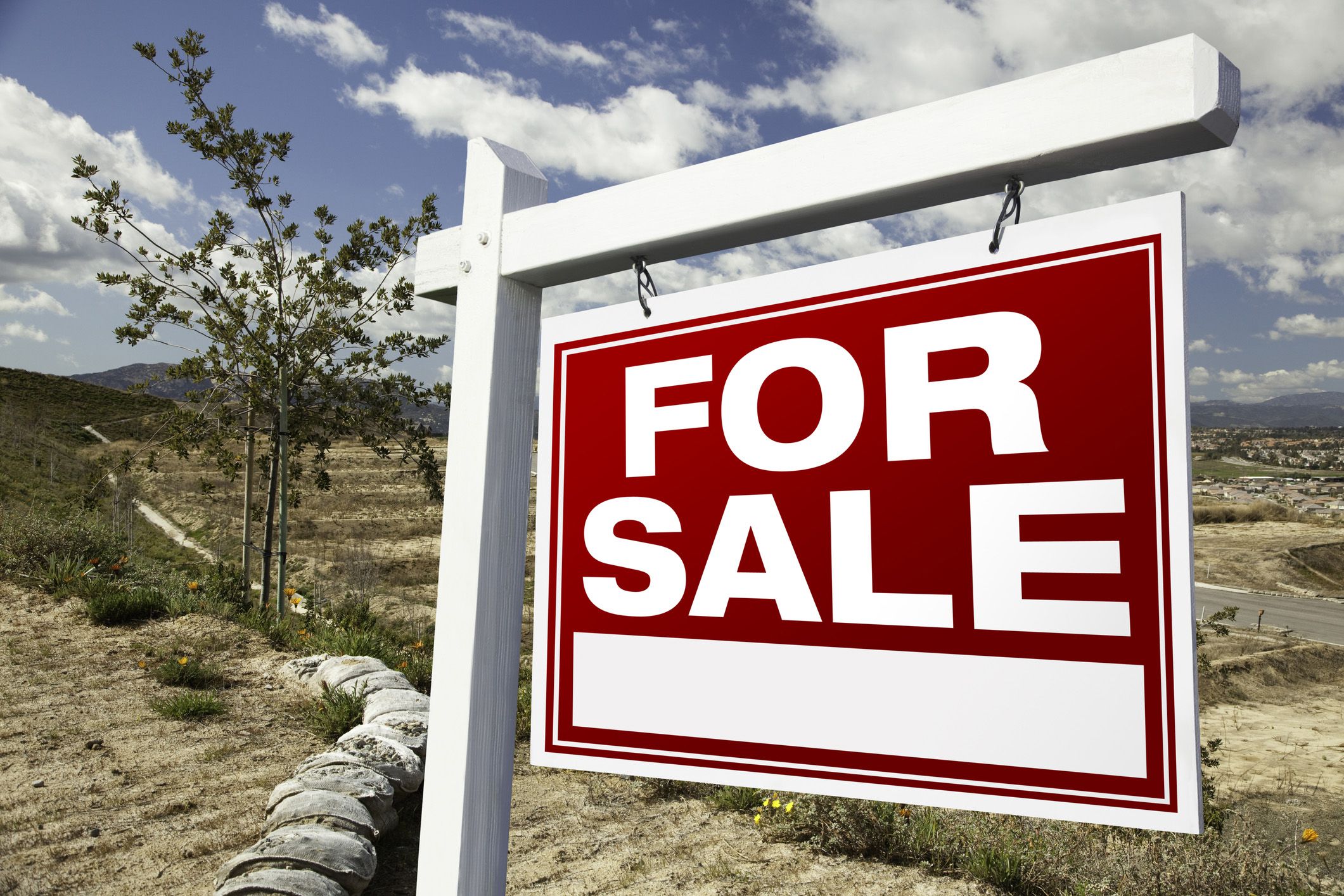 for sale sign on land