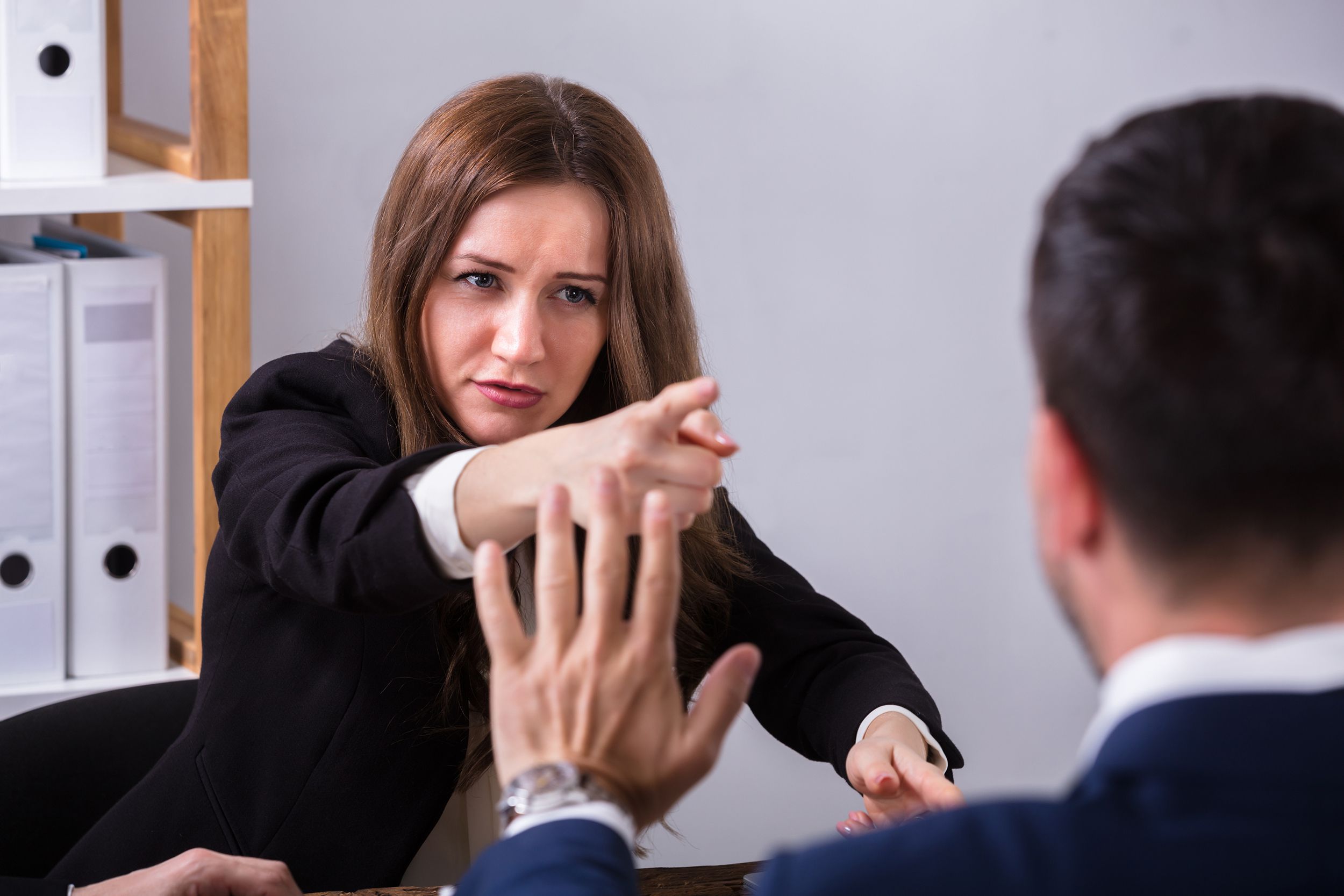 businesswoman scolding her colleague