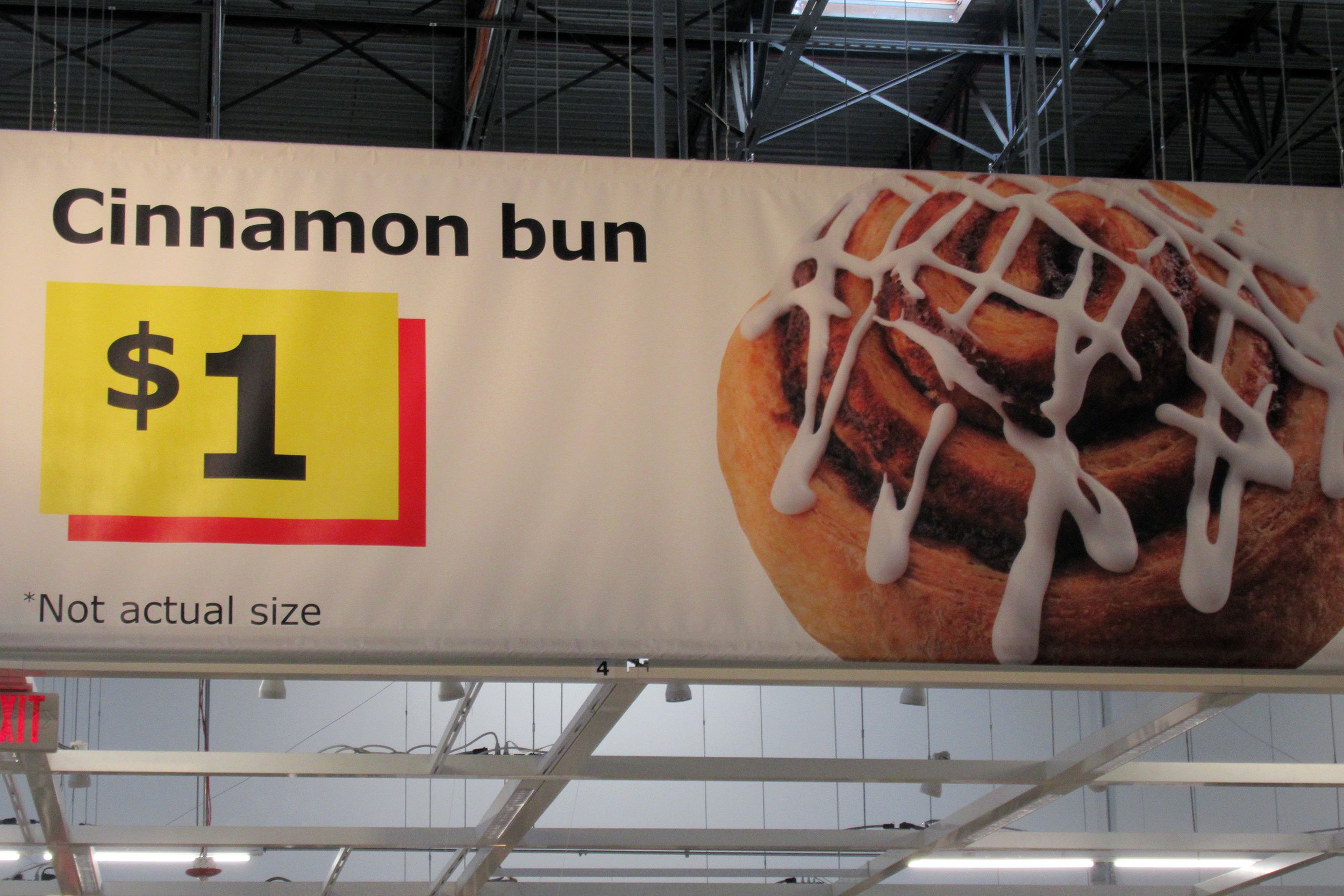 sign for $1 cinnamon bun