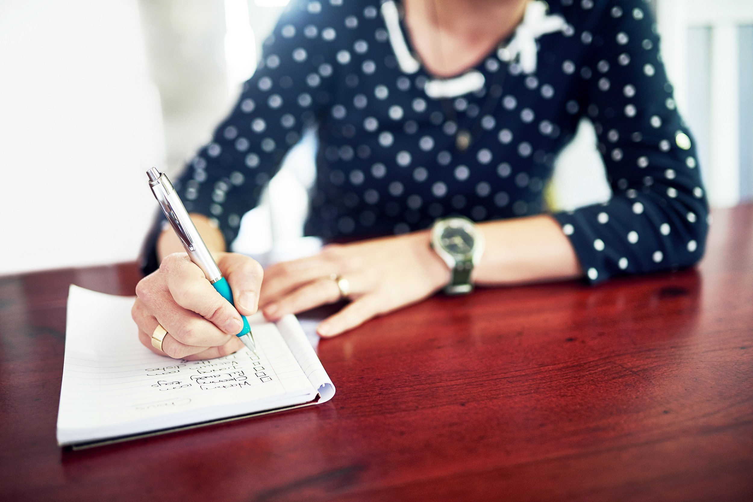 Woman making a checklist