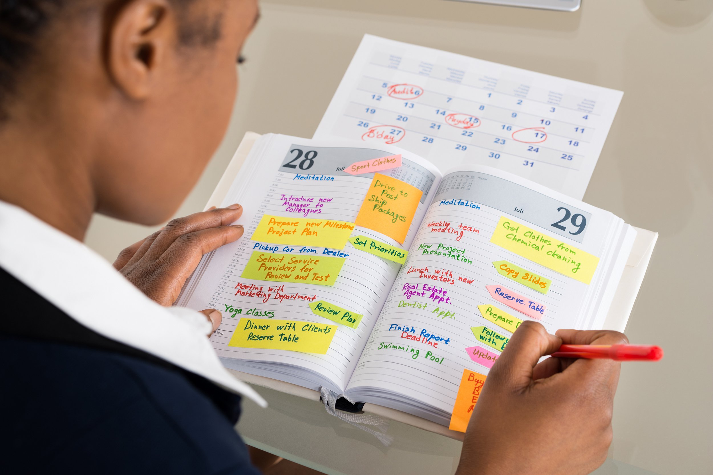 Woman organizing her date book
