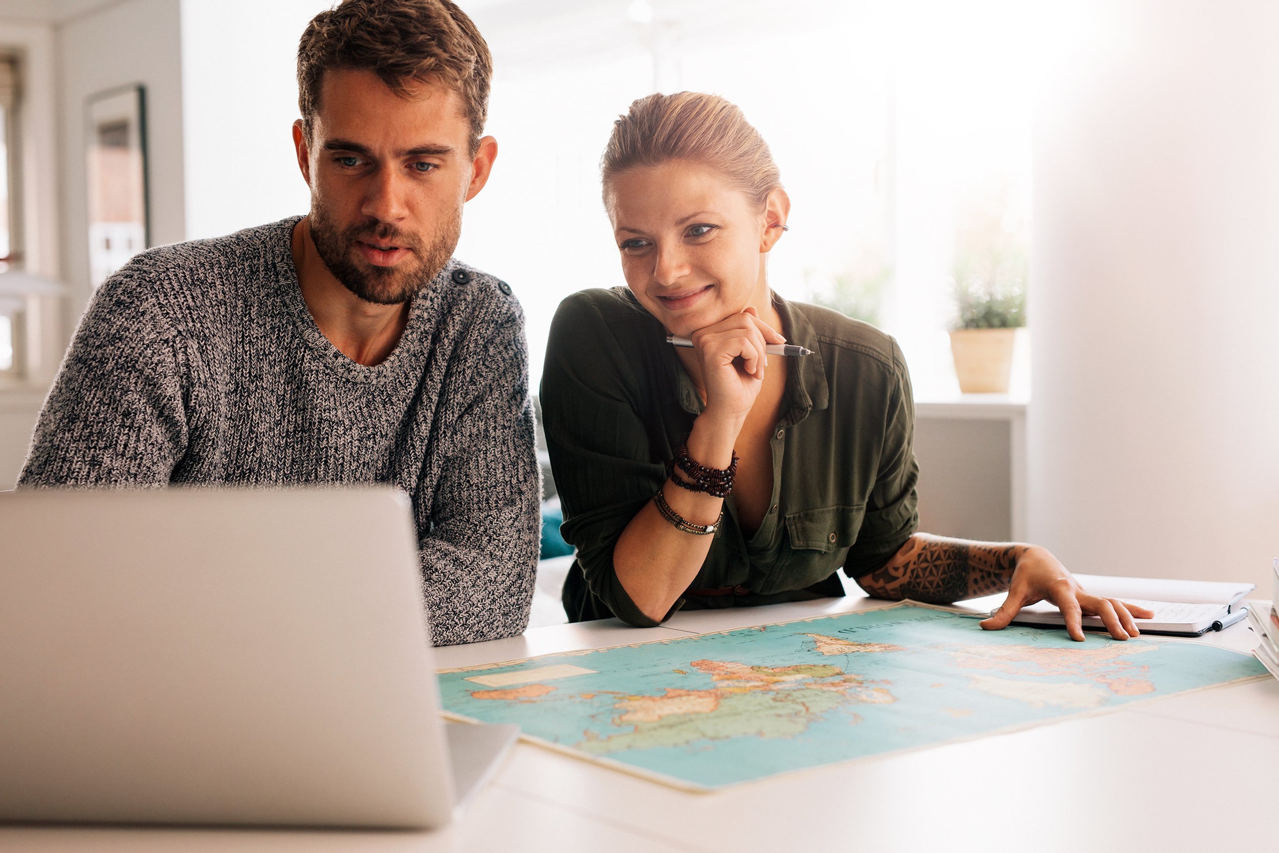 Couple researching travel plans