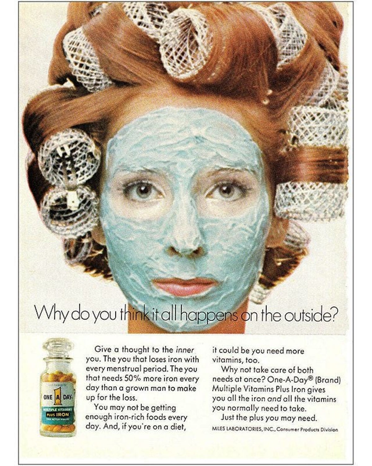 A woman with red hair in rollers and a blue face mask looks at the camera. Below, a bottle of One-A-Day vitamins—reminiscent of first Walmart store items—is shown with promotional text about its benefits for women.