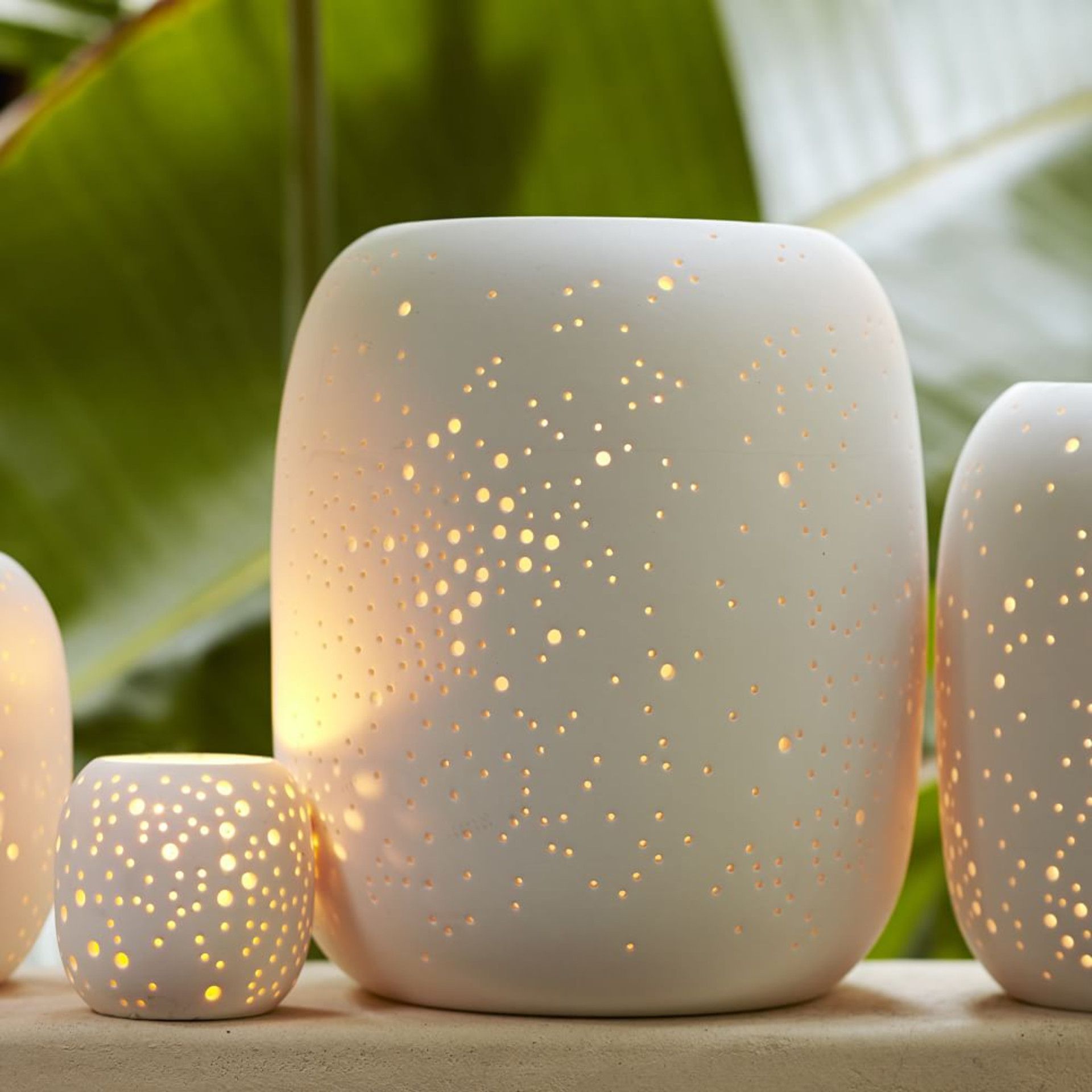 Pierced Constellation Hurricanes & Vases Collection