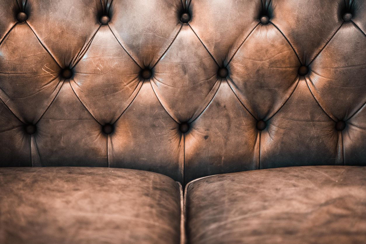 A close-up image of a leather sofa.
