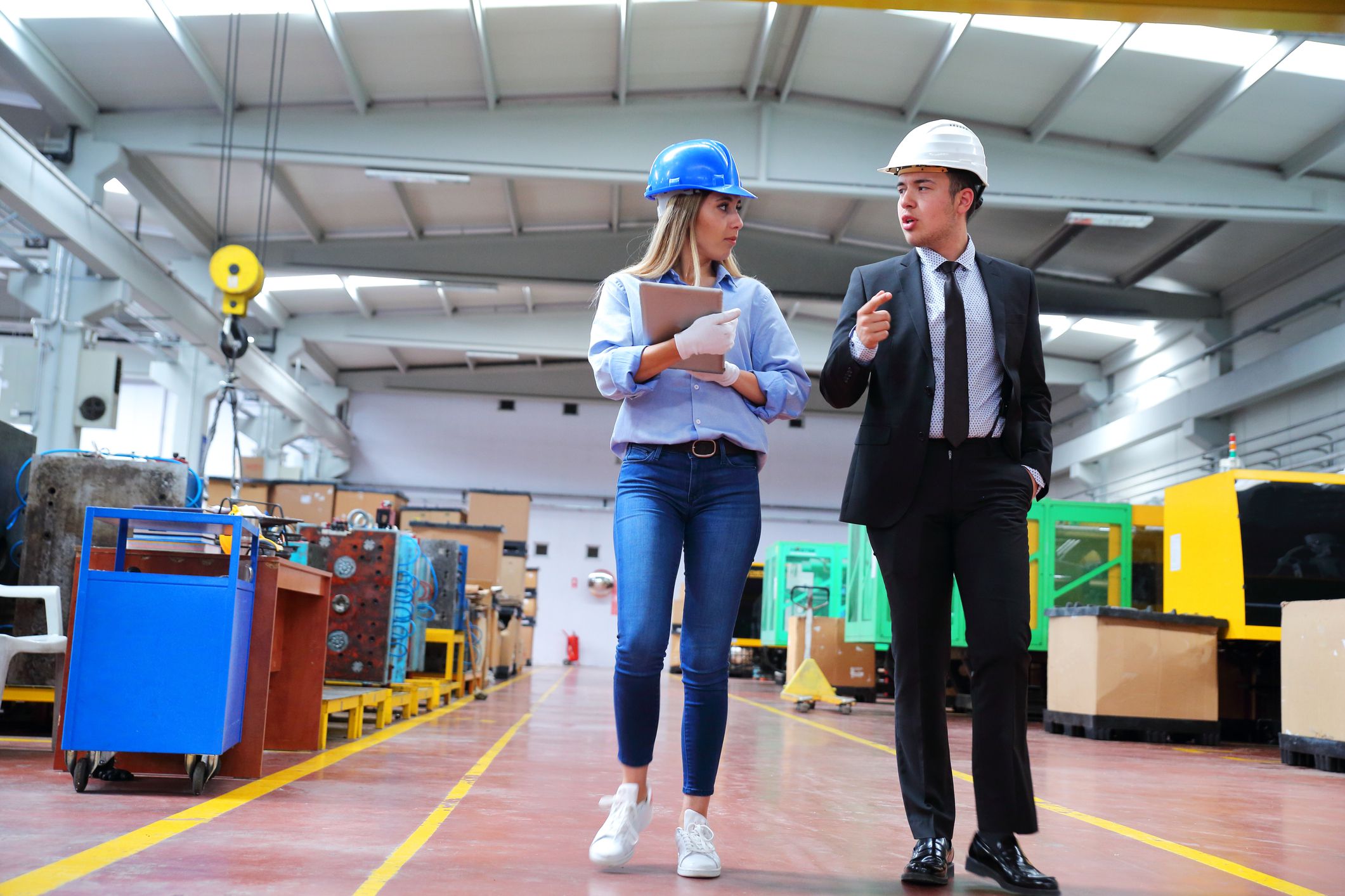 Factory Owner Talking With Operations Manager