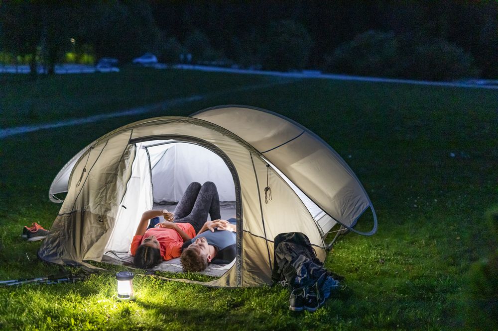 Couple Star Gazing at Night in the European Alps