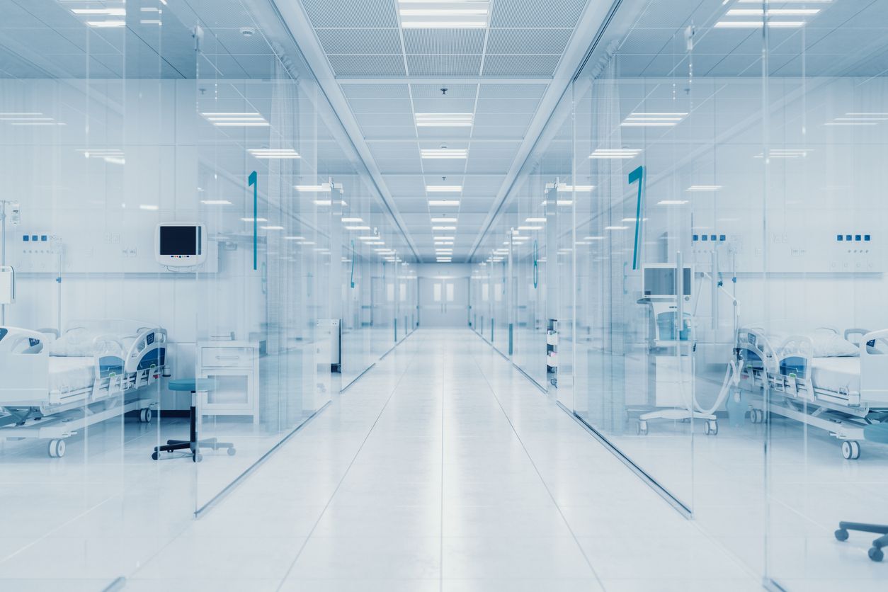 An image of the inside of a hospital building with many high-tech machines.