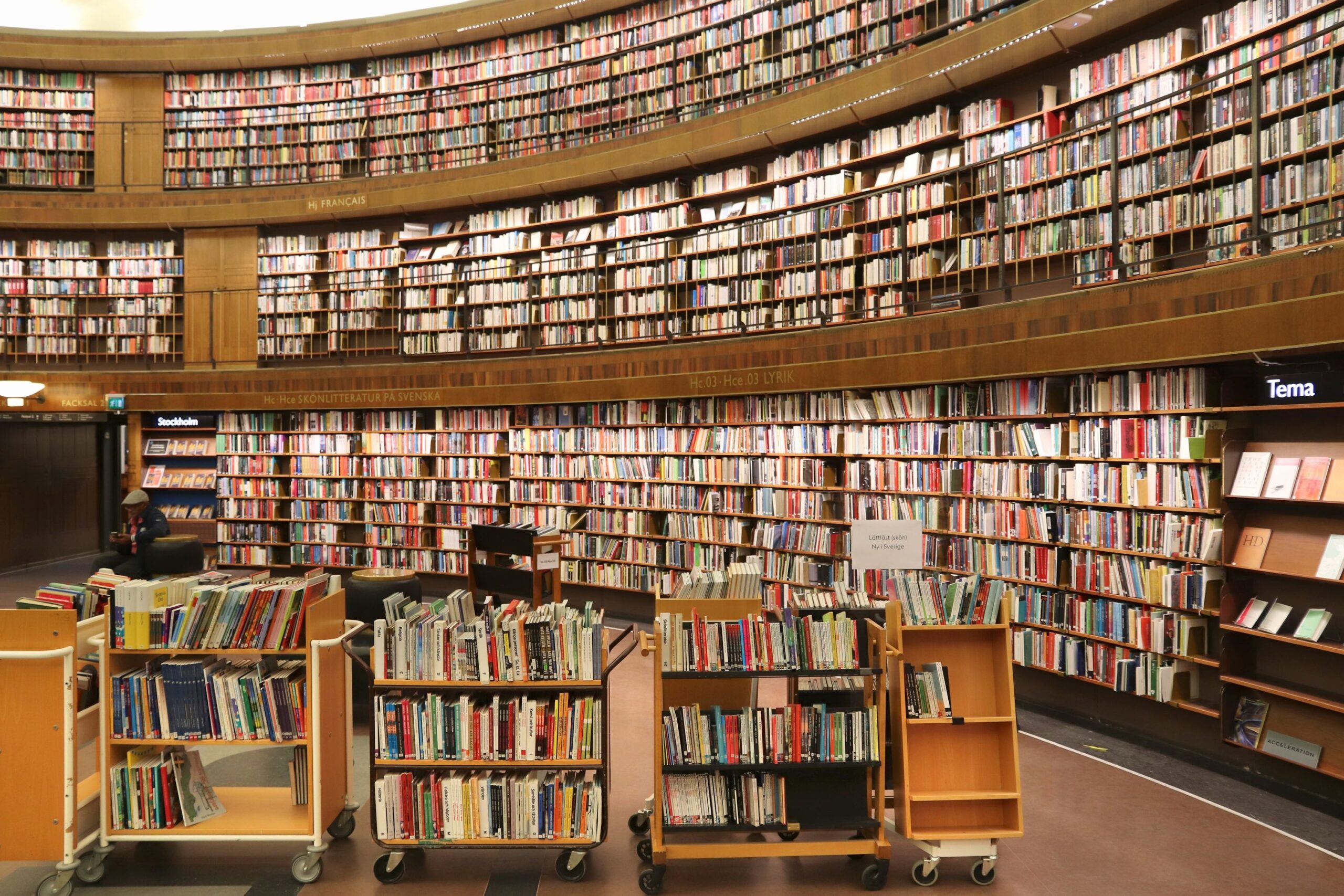 People visit the rounded building of Stockholm Public Library (Stadsbiblioteket). The library was opened in 1928.