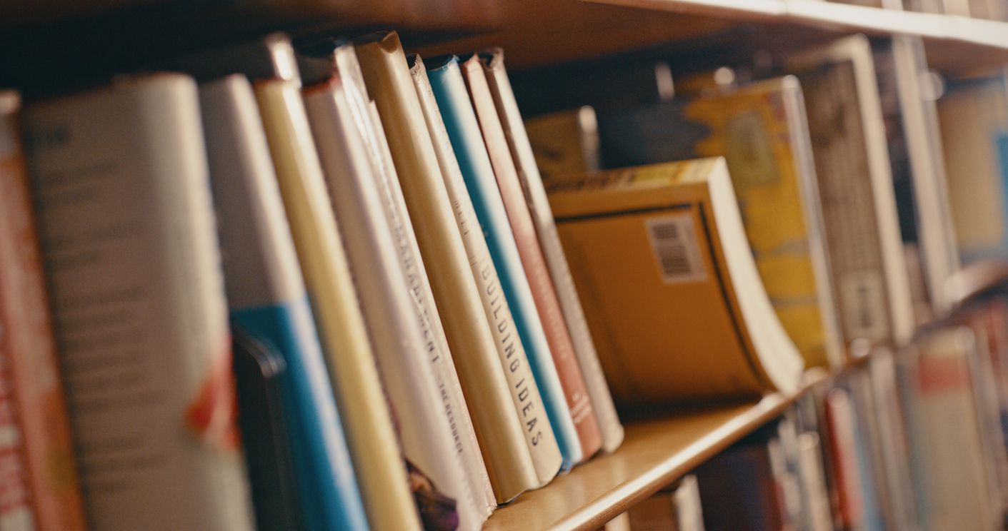 College textbooks on a shelf.