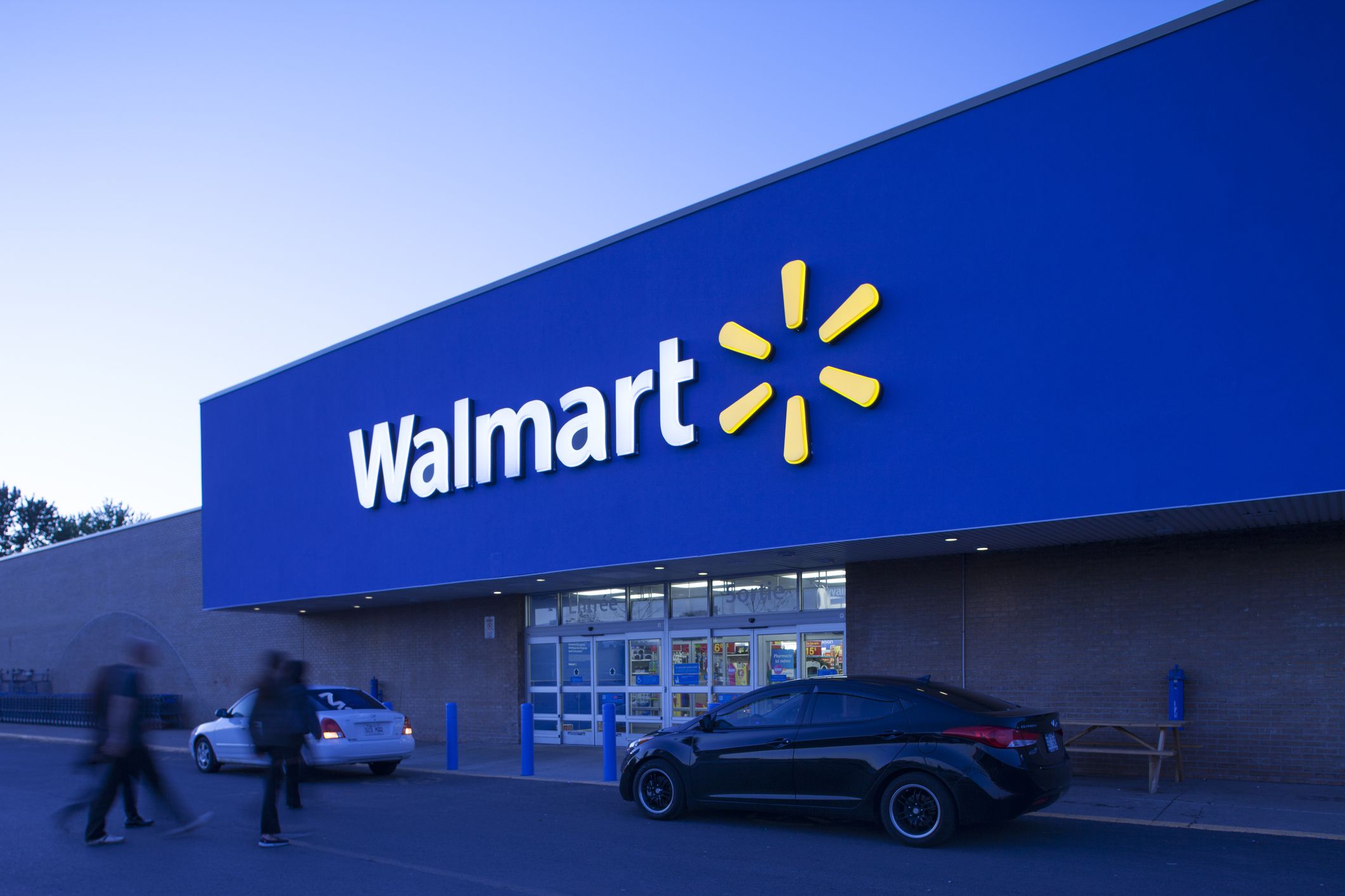 Longueuil,Quebec, Сanada- May 28, 2014: View at Longueuil storefront from its parking lot.Walmart is an American public multinationnal corporation stores and warehouse stores.