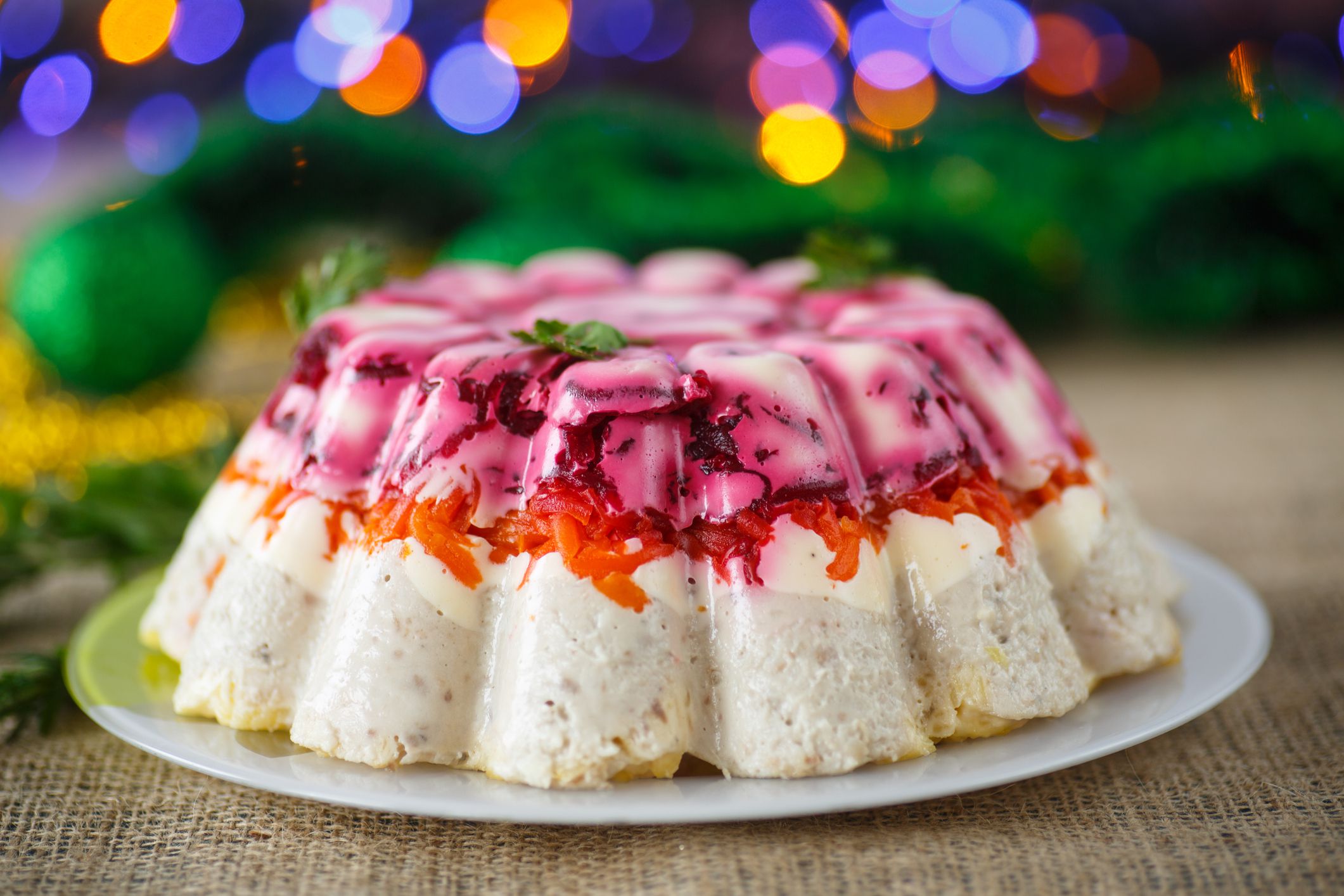 Traditional herring under boiled vegetables for the new year