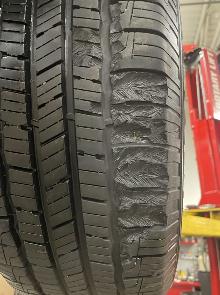 An image of a tire that looks like it was bitten into.