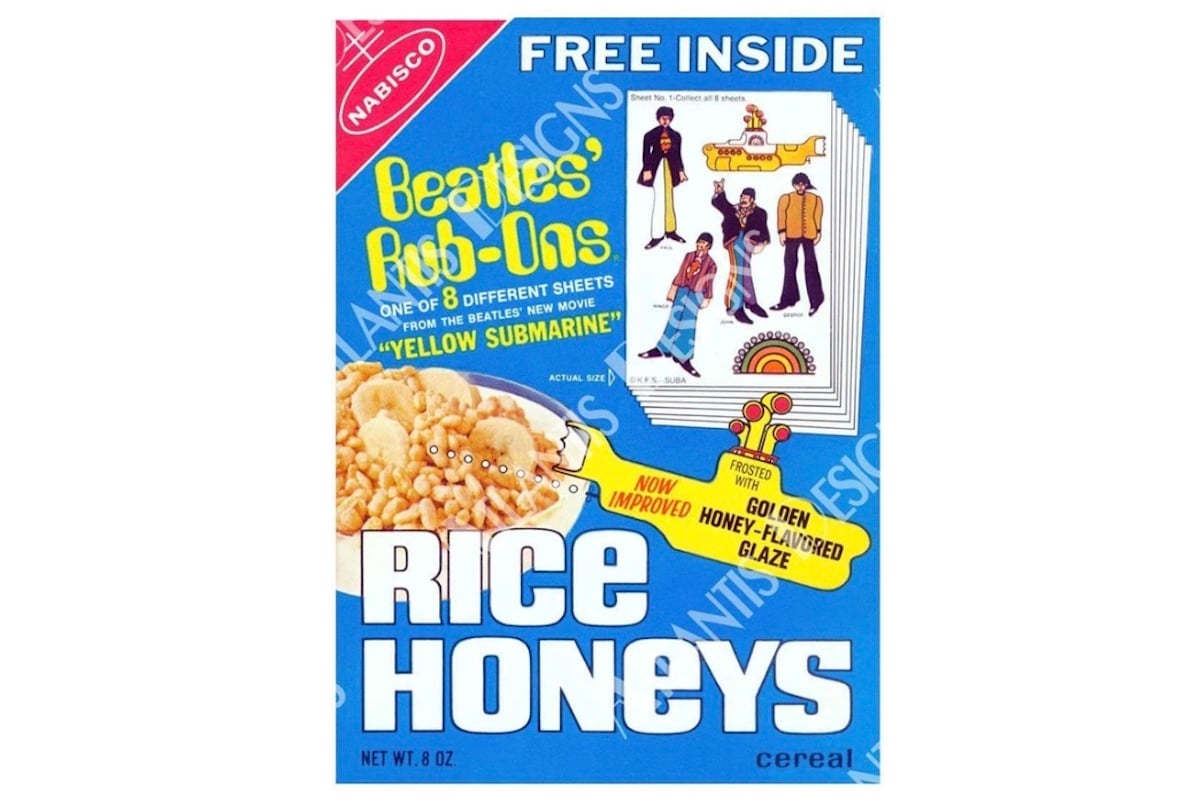 A vintage blue Nabisco Rice Honeys cereal box featuring a promotion for Beatles "Rub-Ons" from the "Yellow Submarine" movie, with cartoon Beatles images and a bowl of cereal—these are now sought-after, expensive collectibles.