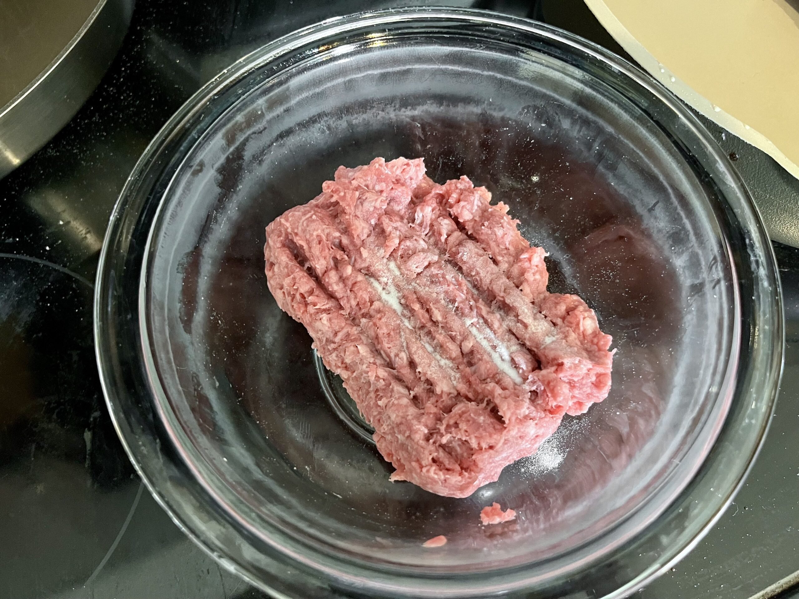 ground beef with baking soda on it