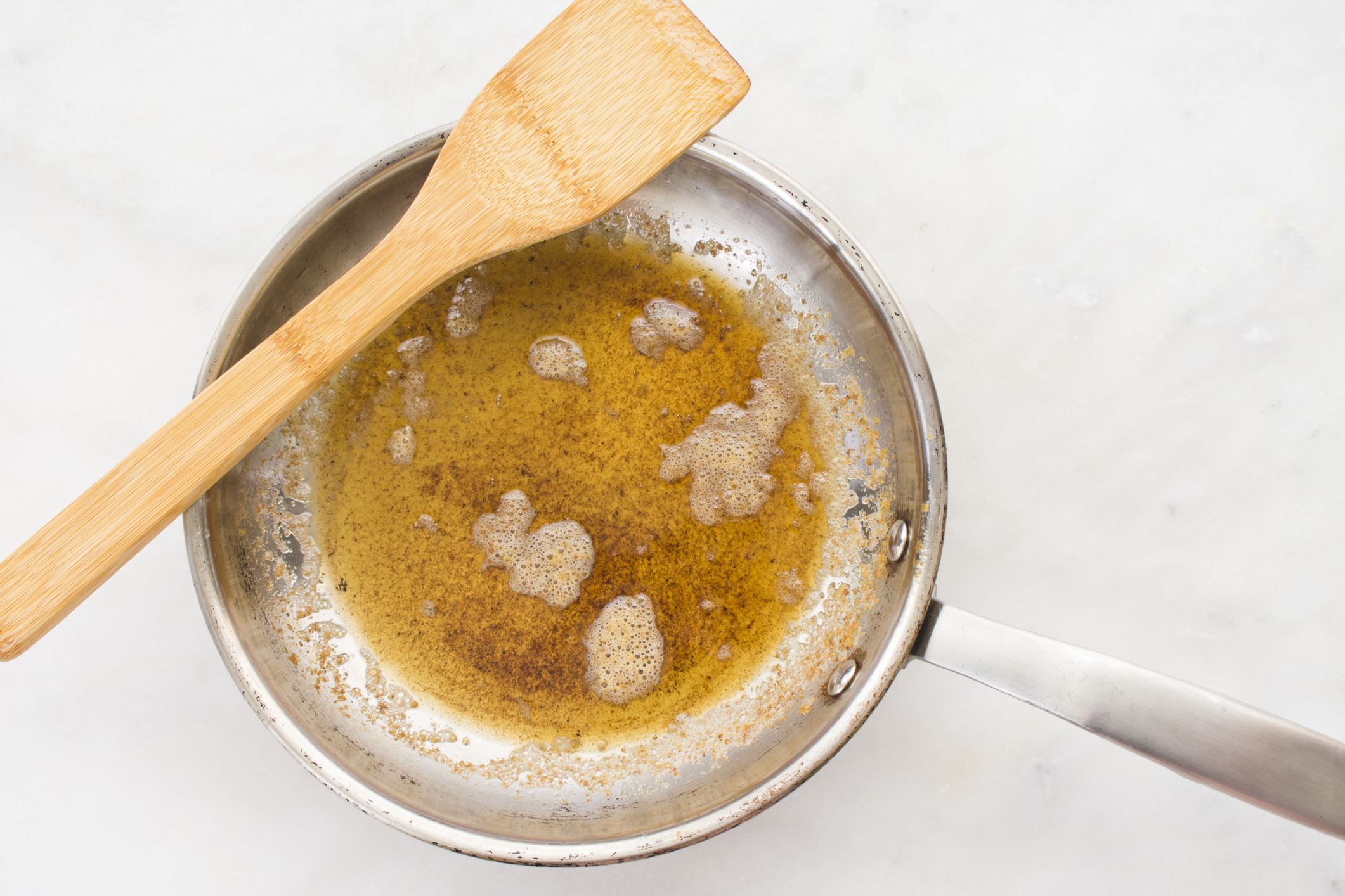 Freshly melted butter in a skillet