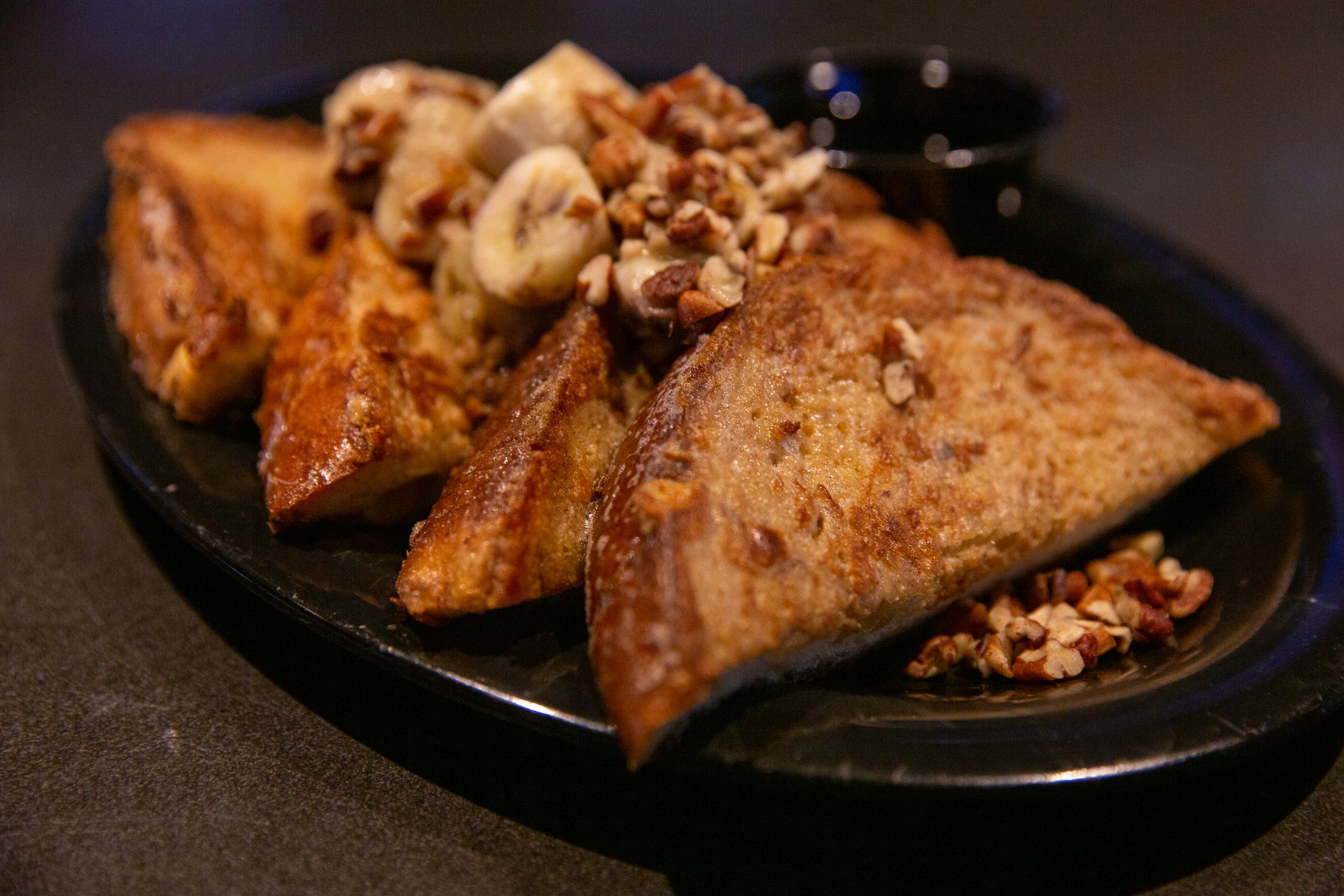 Banana Foster Breakfast with maple syrup for breakfast