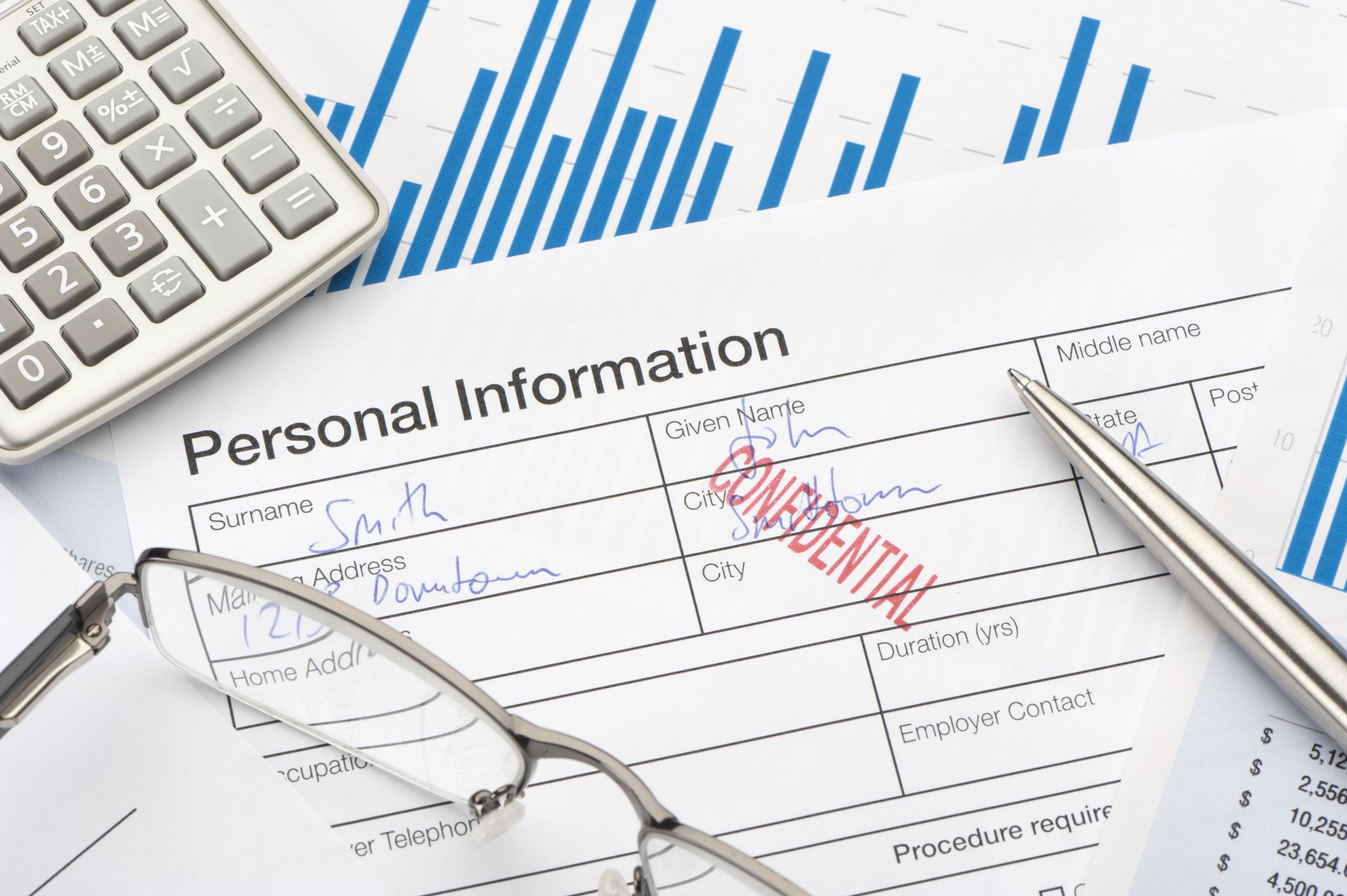 Close up of personal information form with confidential stamp