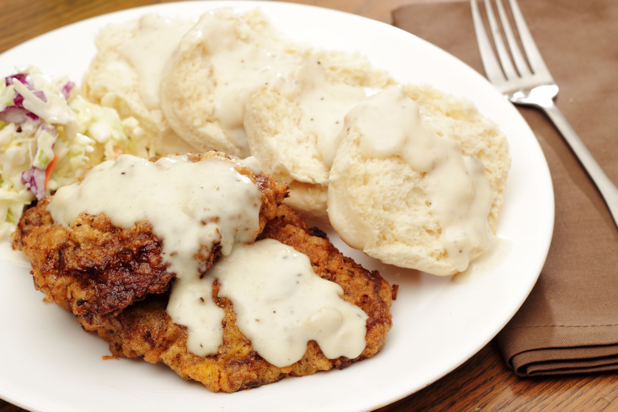 Chicken fried steak with biscuits and country gravy. Served with a side of slawPlease see some similar pictures from my portfolio: