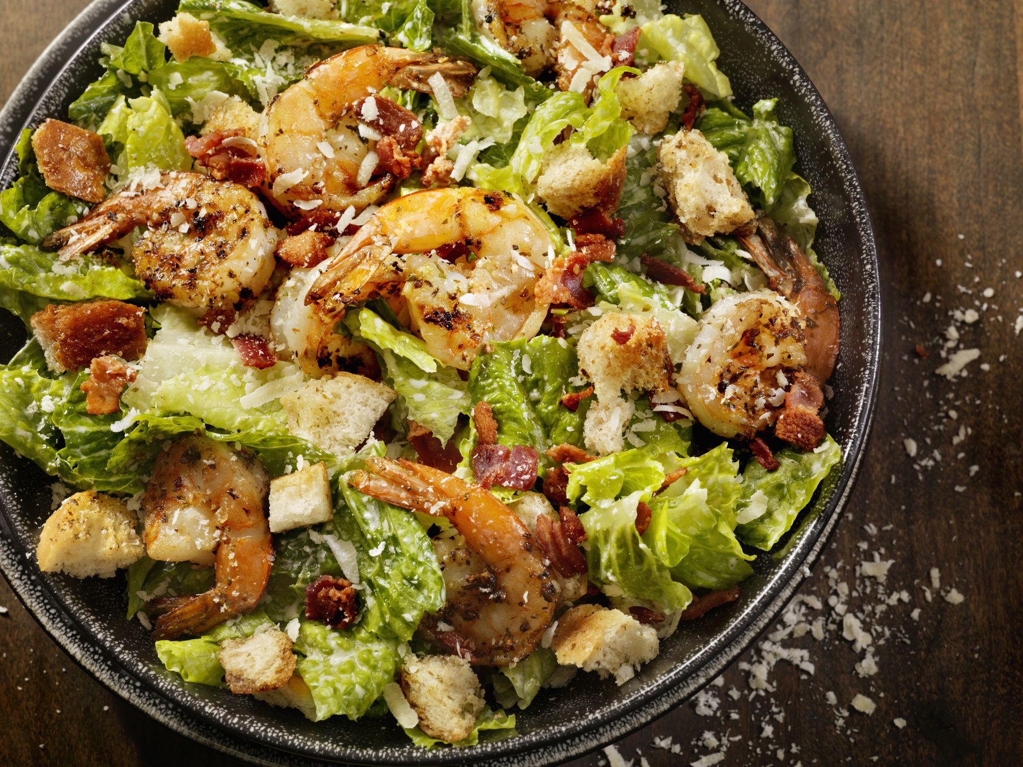 Caesar Salad with Romain Lettuce, Bacon, Capers, Croutons, Freshly Grated Parmesan Cheese and a Toasted Baguette -Photographed on Hasselblad H3D2-39mb Camera