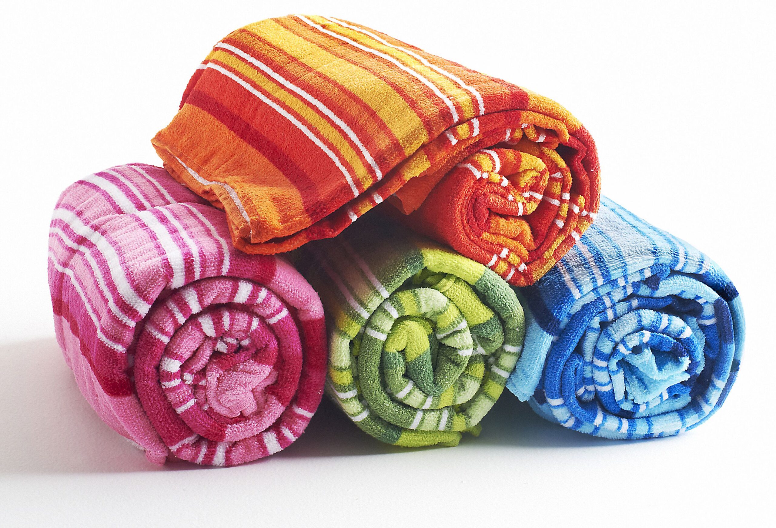 Rolled colorful beach bath (beach) towel.