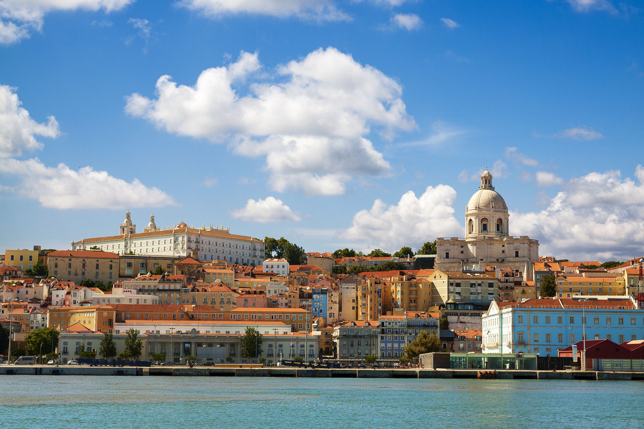 Beautiful view of Lisbon from the Tagus River. The scene is dominated by the Pantheon on the right hand side and the convent of Sao Vicent da Fora at upper left. This is the view that greets visitors arriving by cruise ship.
