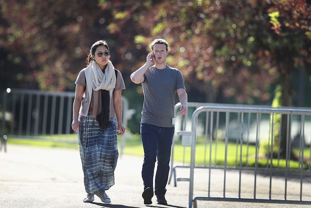 Mark Zuckerberg, chief executive officer and founder of Facebook Inc., and his wife Priscilla Chan attend the Allen & Company Sun Valley Conference on July 10, 2014.
