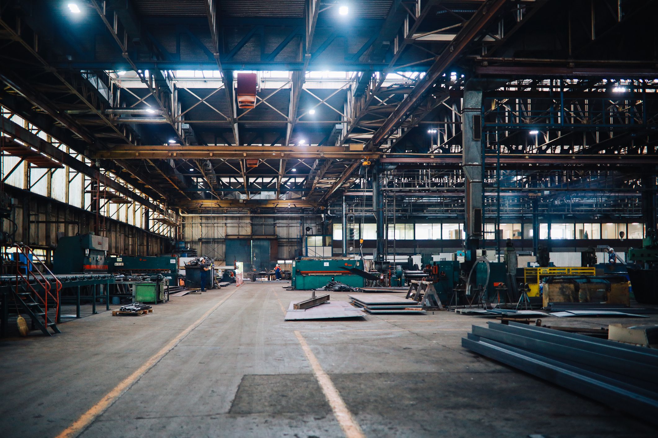Large empty industrial warehouse space.