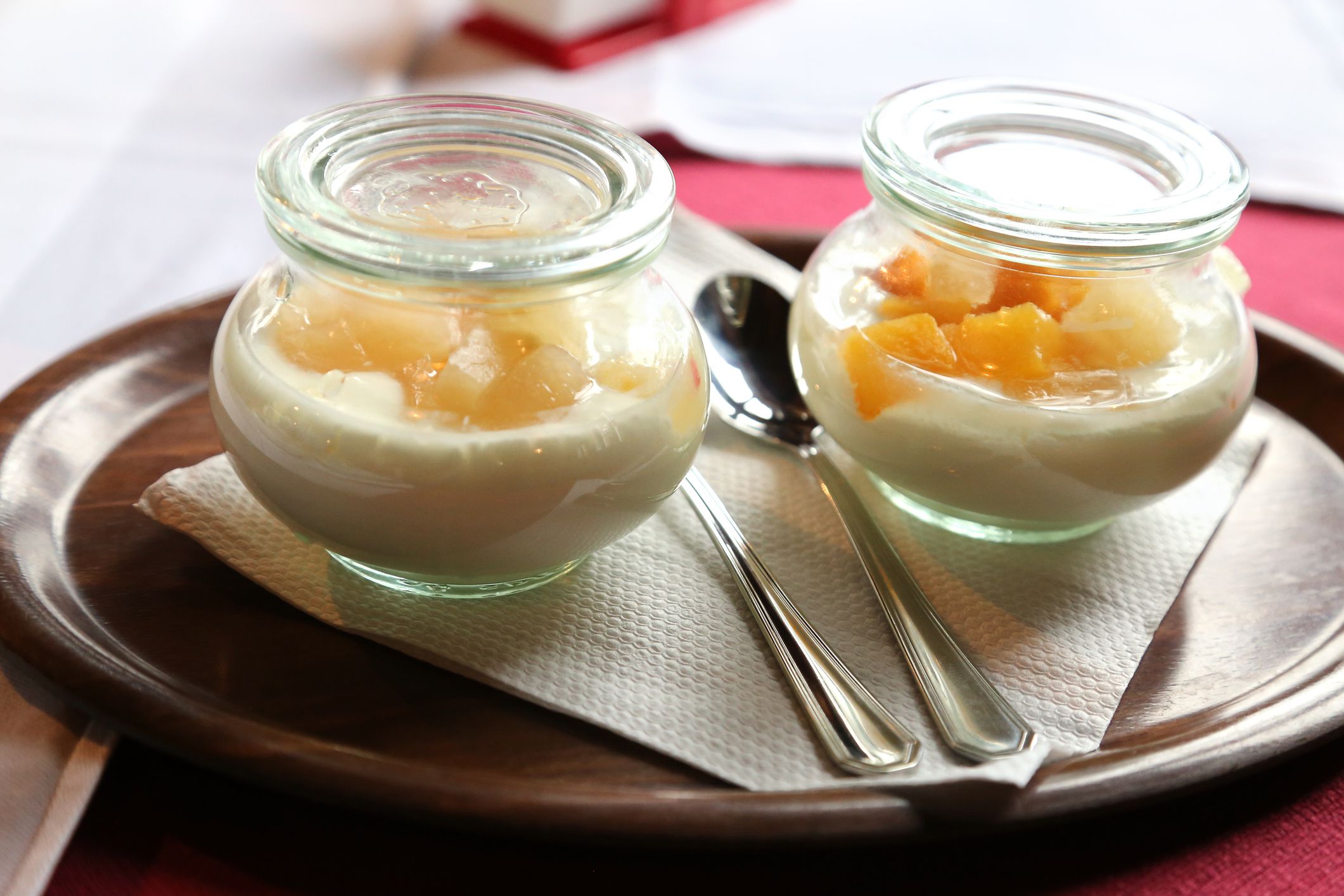 yogurt with fruit on white background