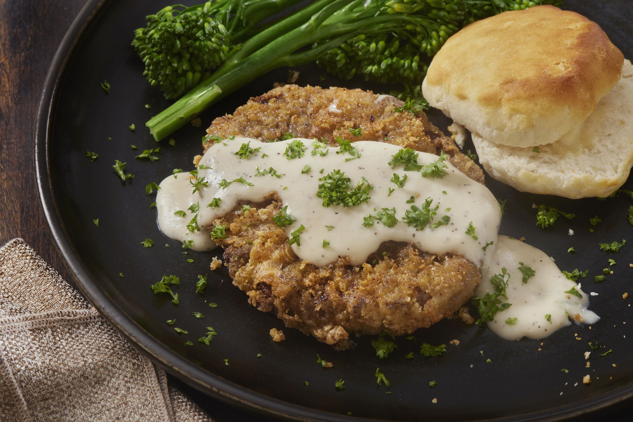 Chicken Fried Steak Burger with Country Style Gravy, Lettuce, Tomato and Fries