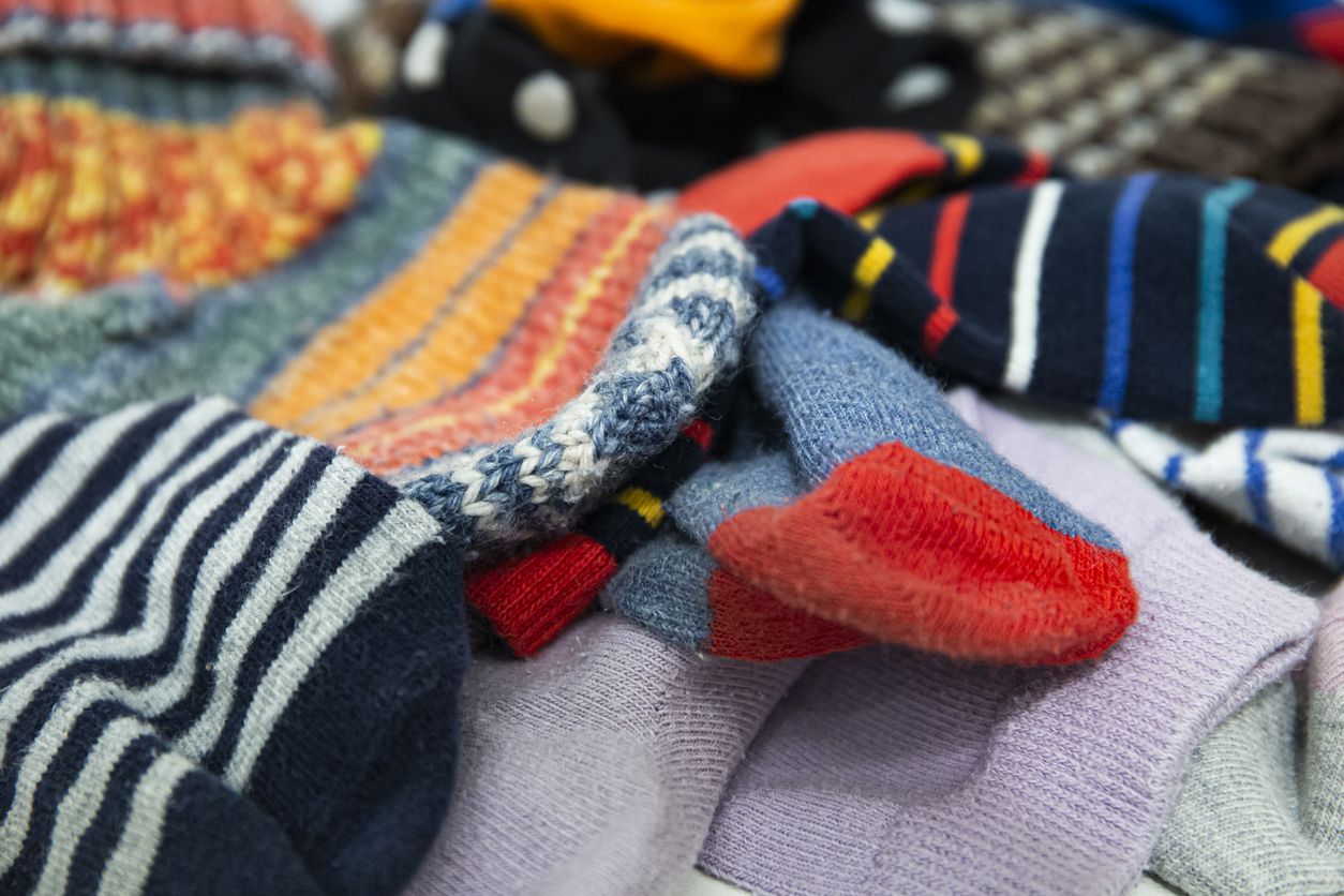 Pile of mismatched colored socks stock photo
