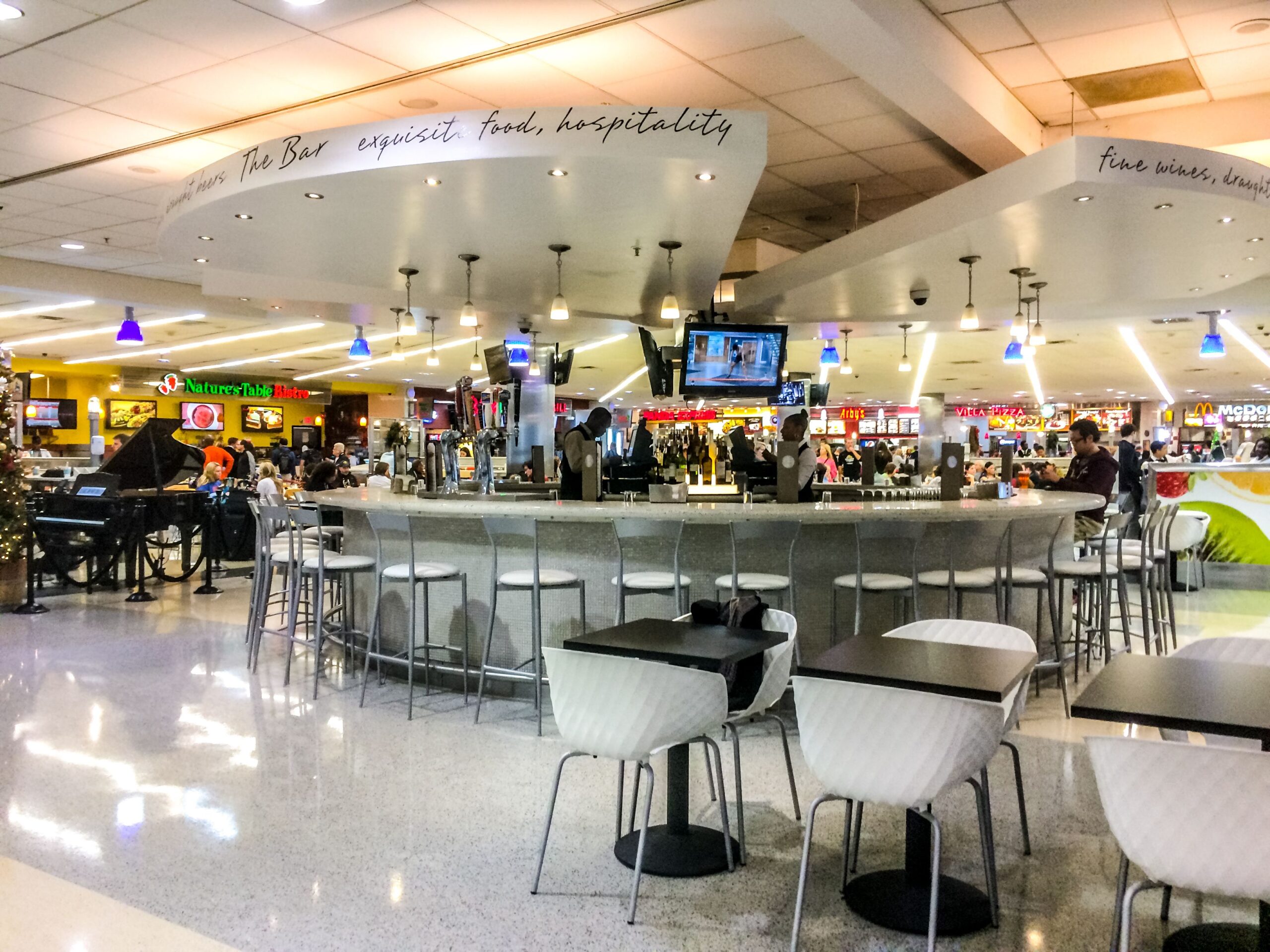 Atlanta, USA - December 29, 2014: People resting at the Bar, Atlanta Airport, USA
