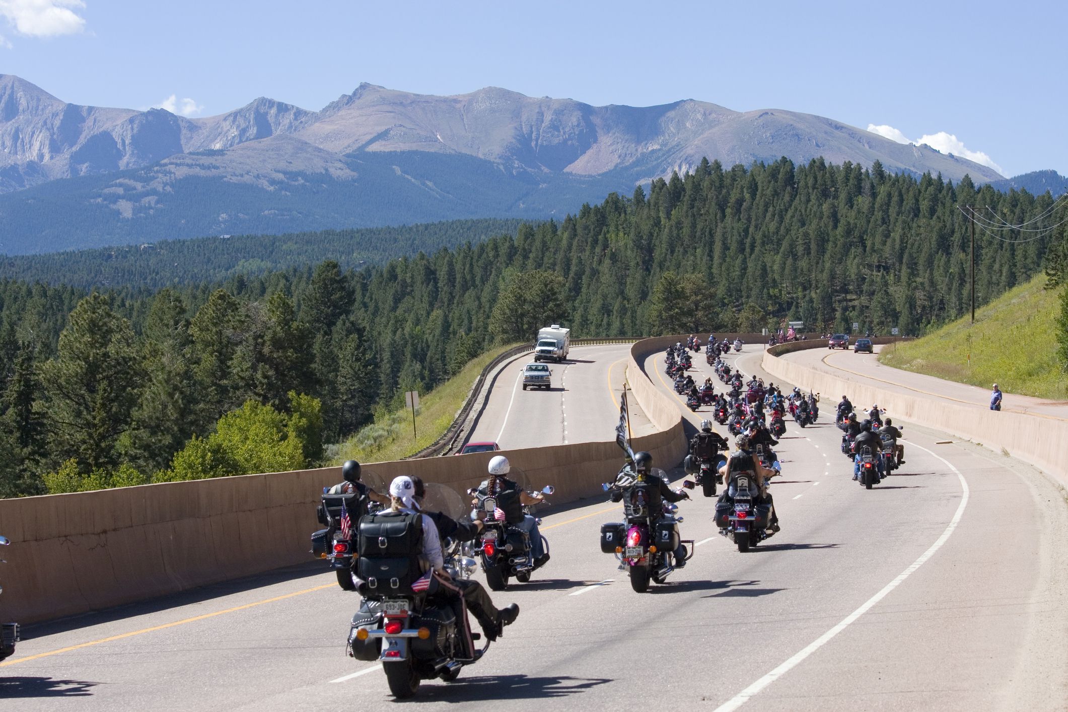 Woodland Park, Colorado, USA - August 16, 2014: Riders in a motorcycle rally to honor U.S. veterans runs from Woodland Park, Colorado to Cripple Creek, Colorado on Highway 24