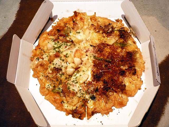 Korean Pizza with seafood and bulgogi