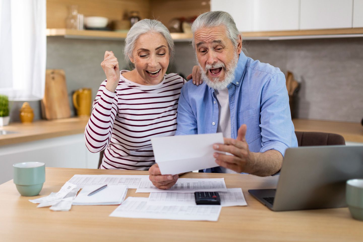 Elderly couple excited that they paid off debt