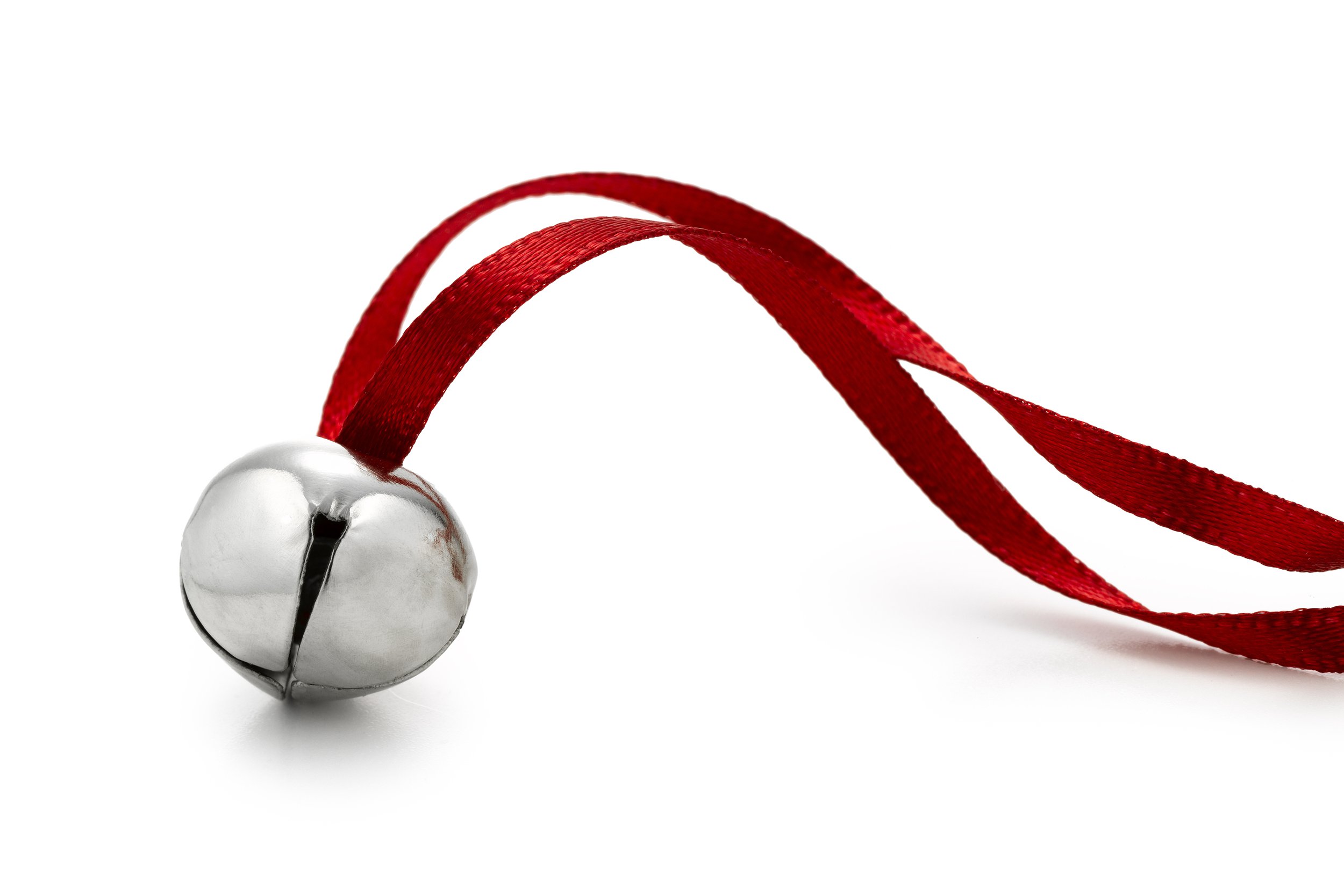 Silver jingle bell on a red string