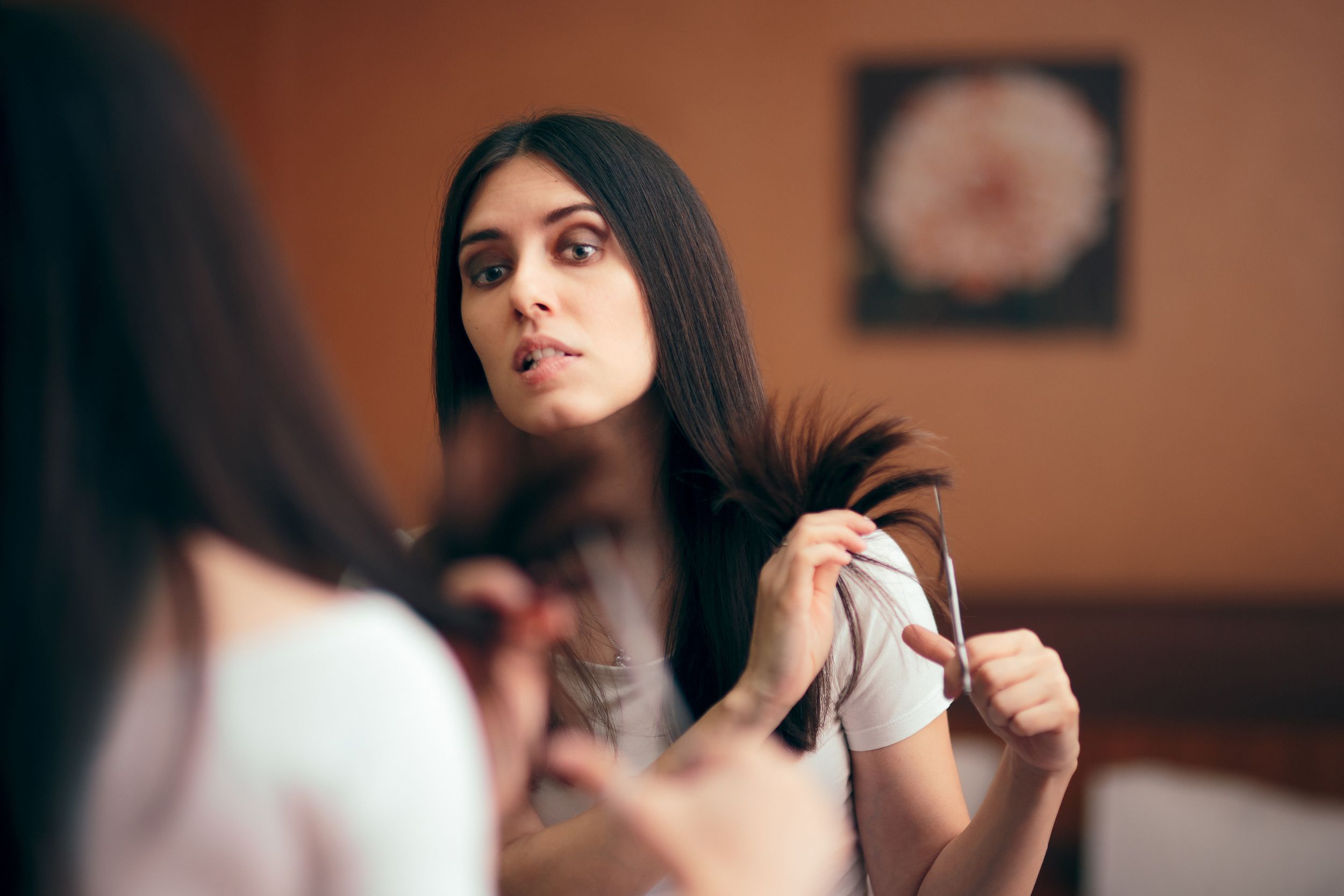 woman changing looks giving herself a with DIY cut