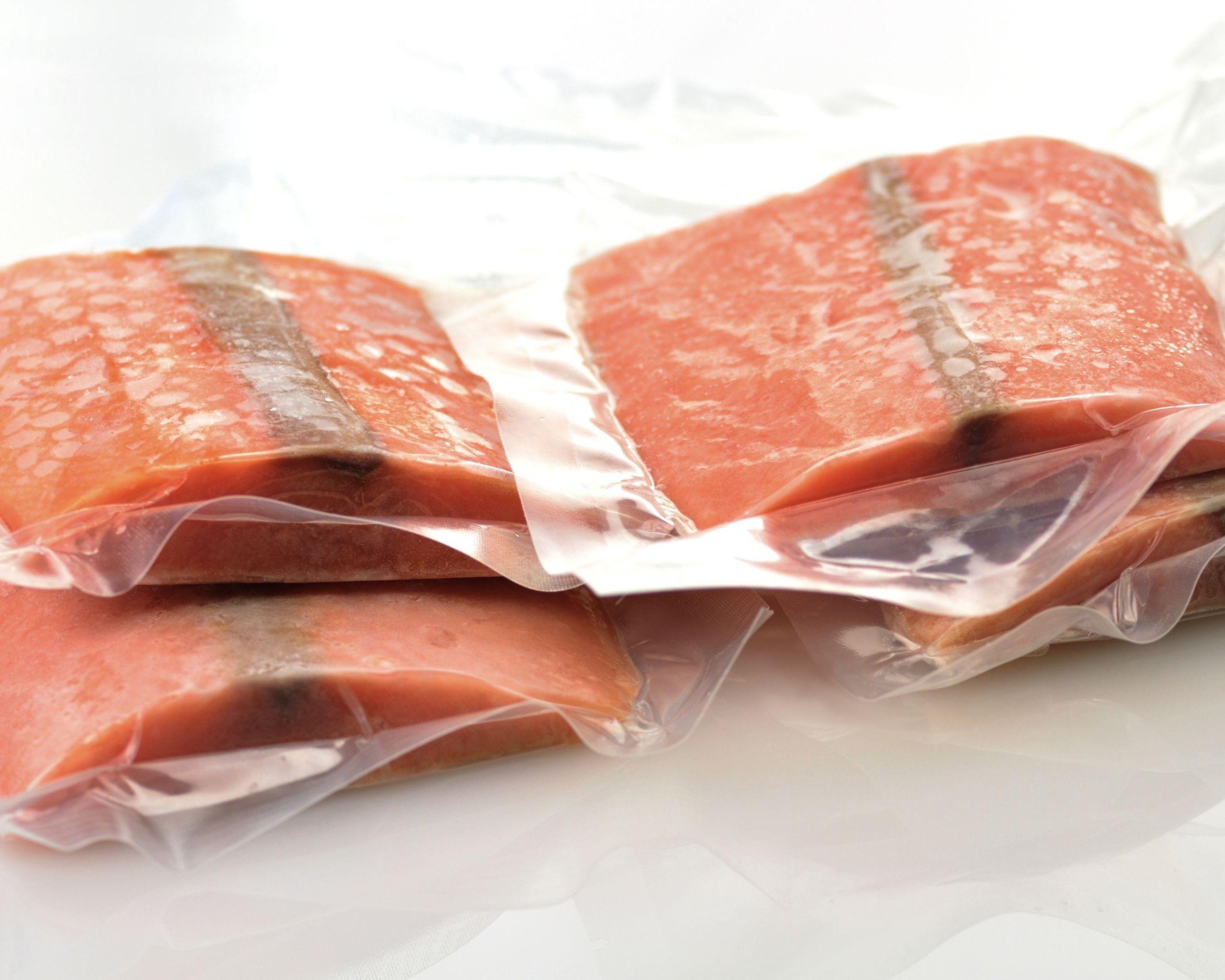 frozen salmon fillets in a vacuum package